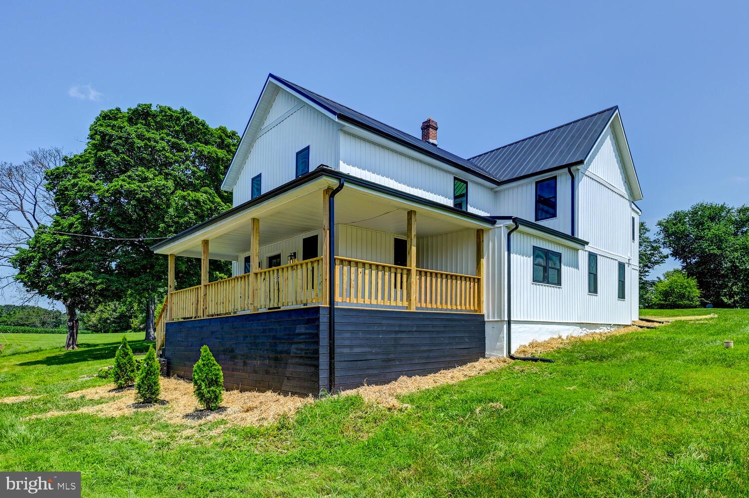 4414 Mt Carmel Road Hampstead, MD 21074 - Photo 32 of 40 a front view of a house with a yard