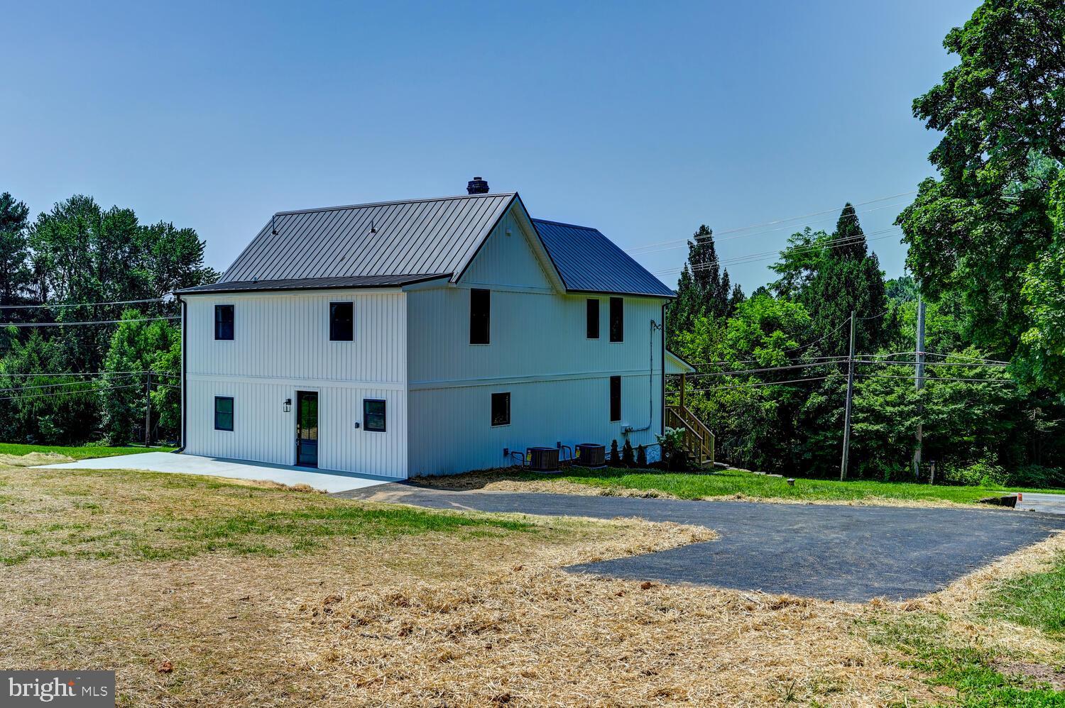 4414 Mt Carmel Road Hampstead, MD 21074 - Photo 34 of 40 a house with trees in the background