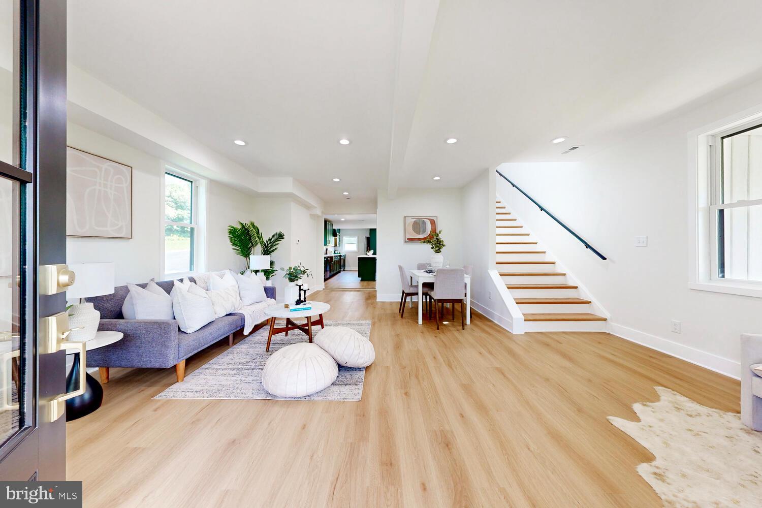 4414 Mt Carmel Road Hampstead, MD 21074 - Photo 4 of 40 a living room with furniture and a wooden floor