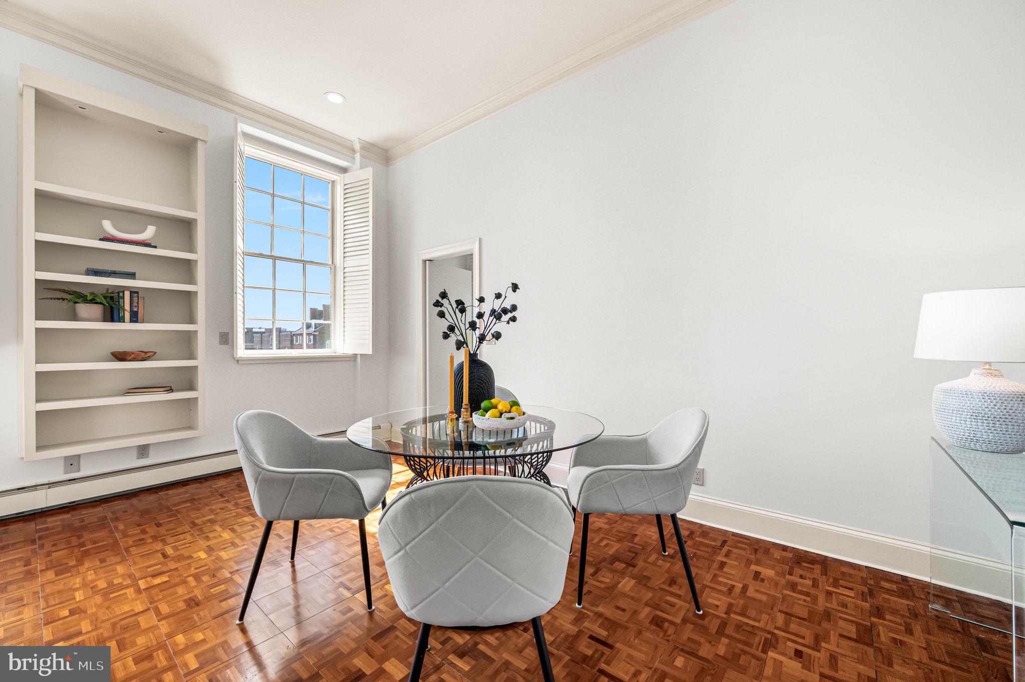 211 South 4th Street, Unit 301 Philadelphia, PA 19106 - Photo 8 of 42 a dining room with furniture and wooden floor