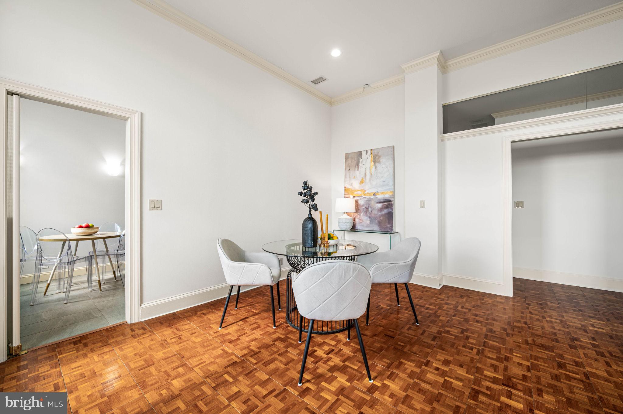 211 South 4th Street, Unit 301 Philadelphia, PA 19106 - Photo 10 of 42 a dining room with furniture and wooden floor