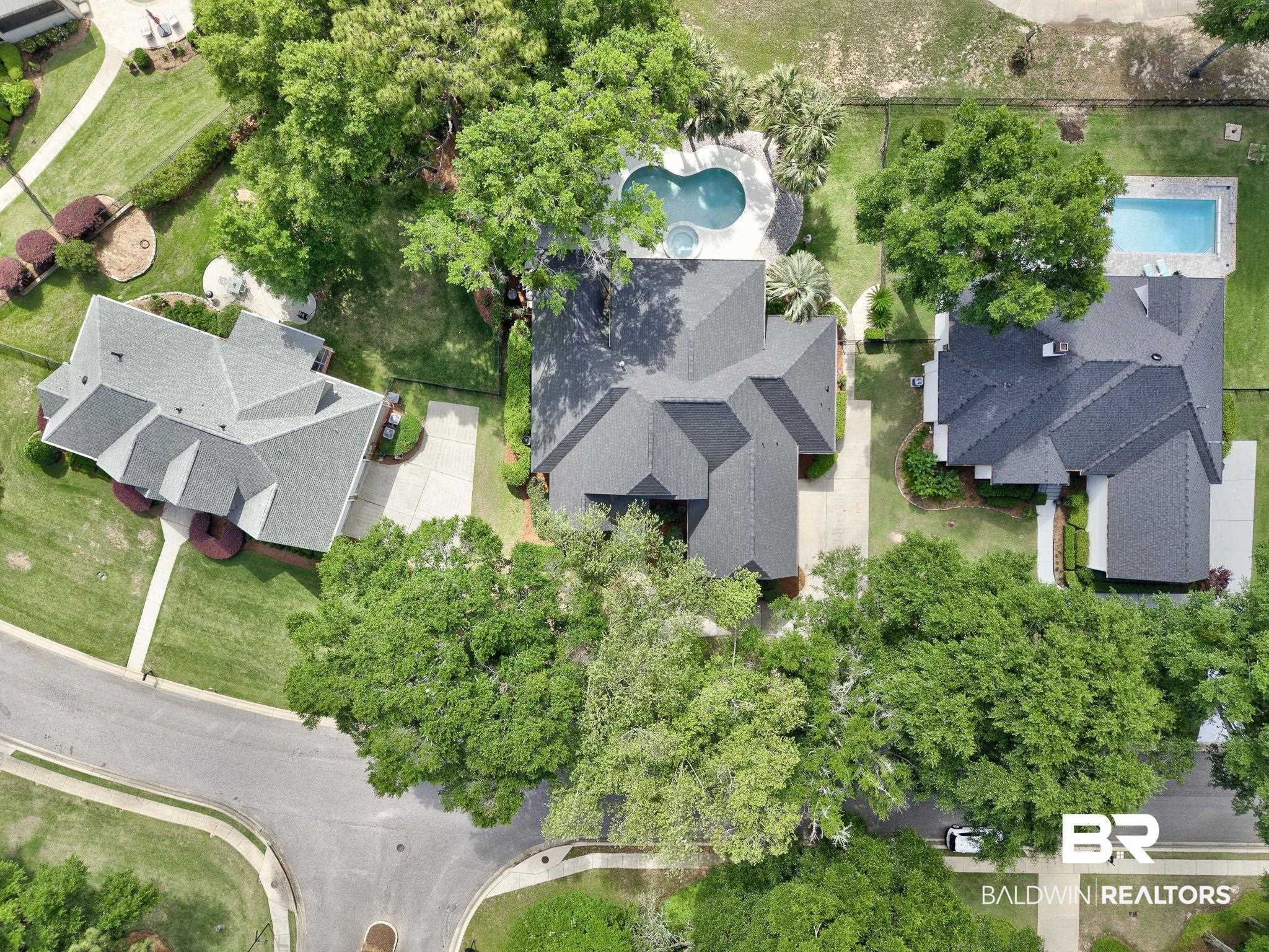 105 High Pines Ridge Fairhope, AL 36532 - Photo 97 of 97 Aerial view of property and surrounding area with a pool area
