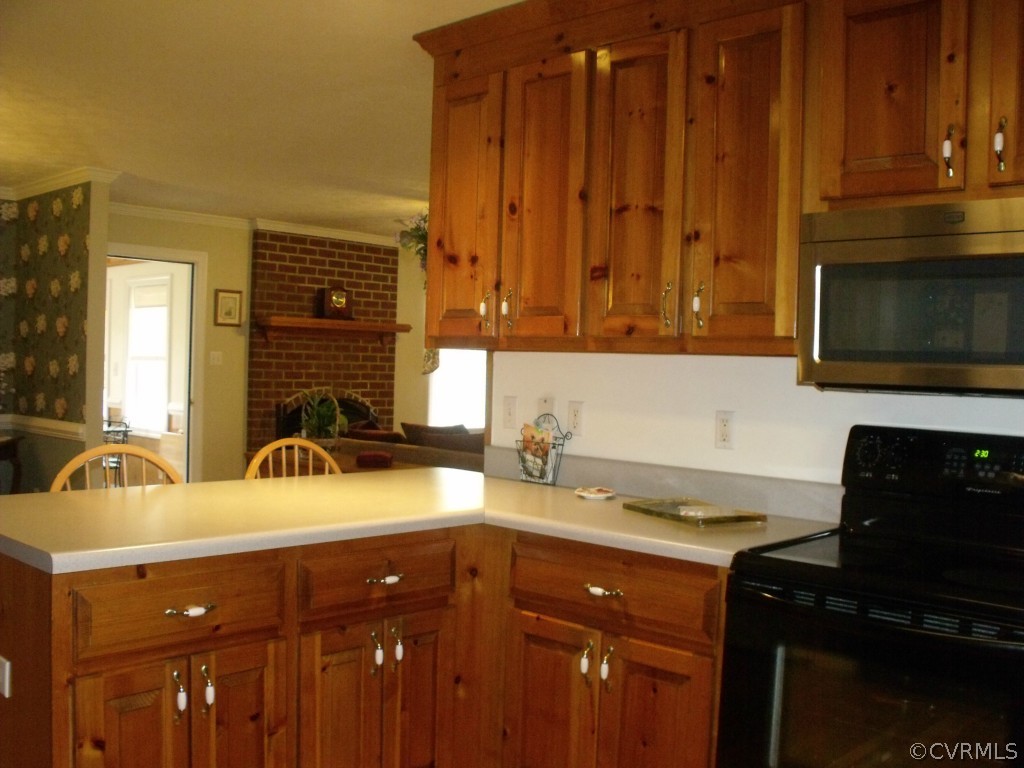 9811 Taylor Road Chesterfield, VA 23838 - Photo 15 of 24 a kitchen with sink and cabinets