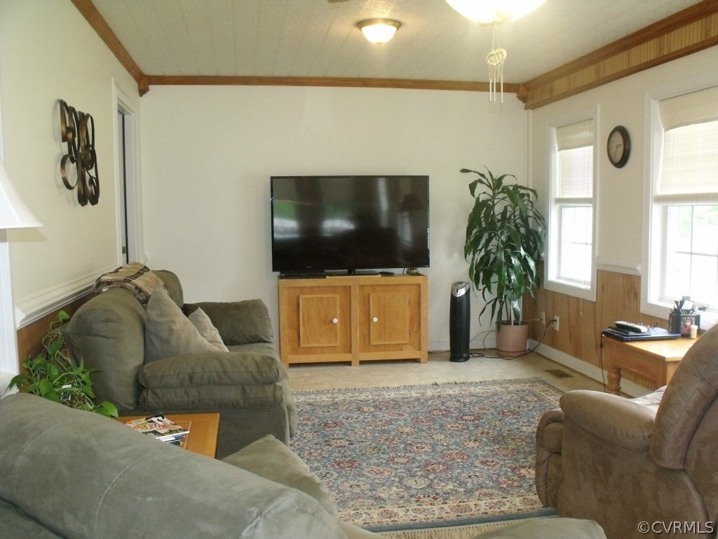 9811 Taylor Road Chesterfield, VA 23838 - Photo 19 of 24 a living room with furniture and a flat screen tv