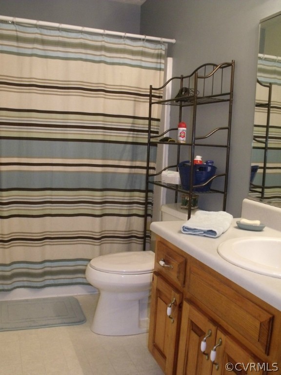 9811 Taylor Road Chesterfield, VA 23838 - Photo 6 of 24 a bathroom with a sink and toilet