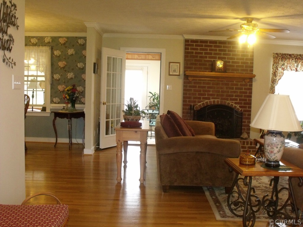 9811 Taylor Road Chesterfield, VA 23838 - Photo 9 of 24 a living room with furniture and a fireplace
