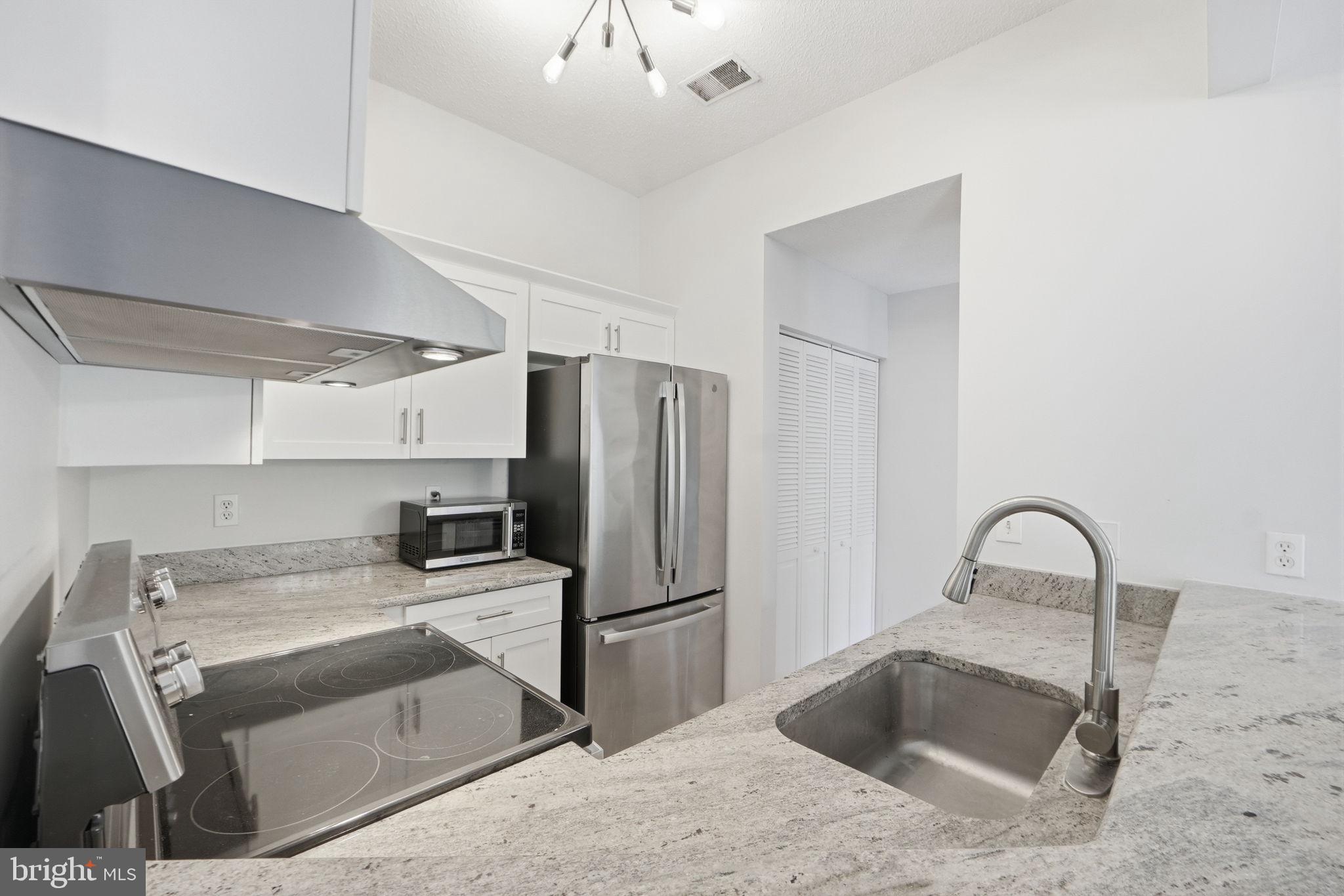 1968 Villaridge Drive Reston, VA 20191 - Photo 14 of 39 Granite countertops, undermount sink