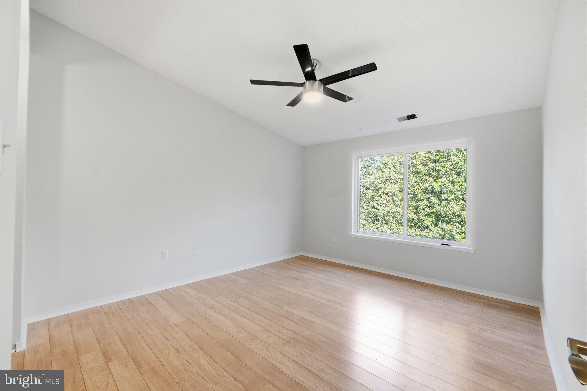 1968 Villaridge Drive Reston, VA 20191 - Photo 17 of 39 Bedroom with vaulted ceiling & ceiling fan