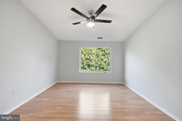 a view of an empty walk in closet