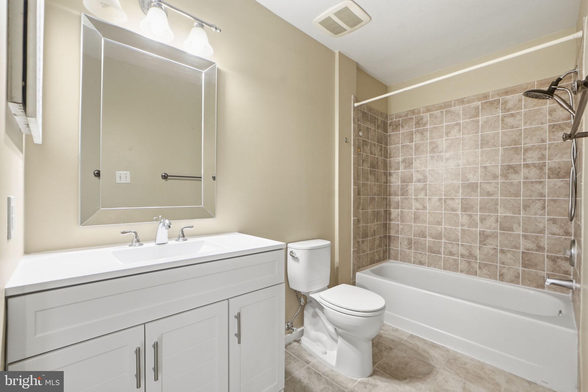 1968 Villaridge Drive Reston, VA 20191 - Photo 7 of 39 Updated bath with new vanity, toilet and mirror