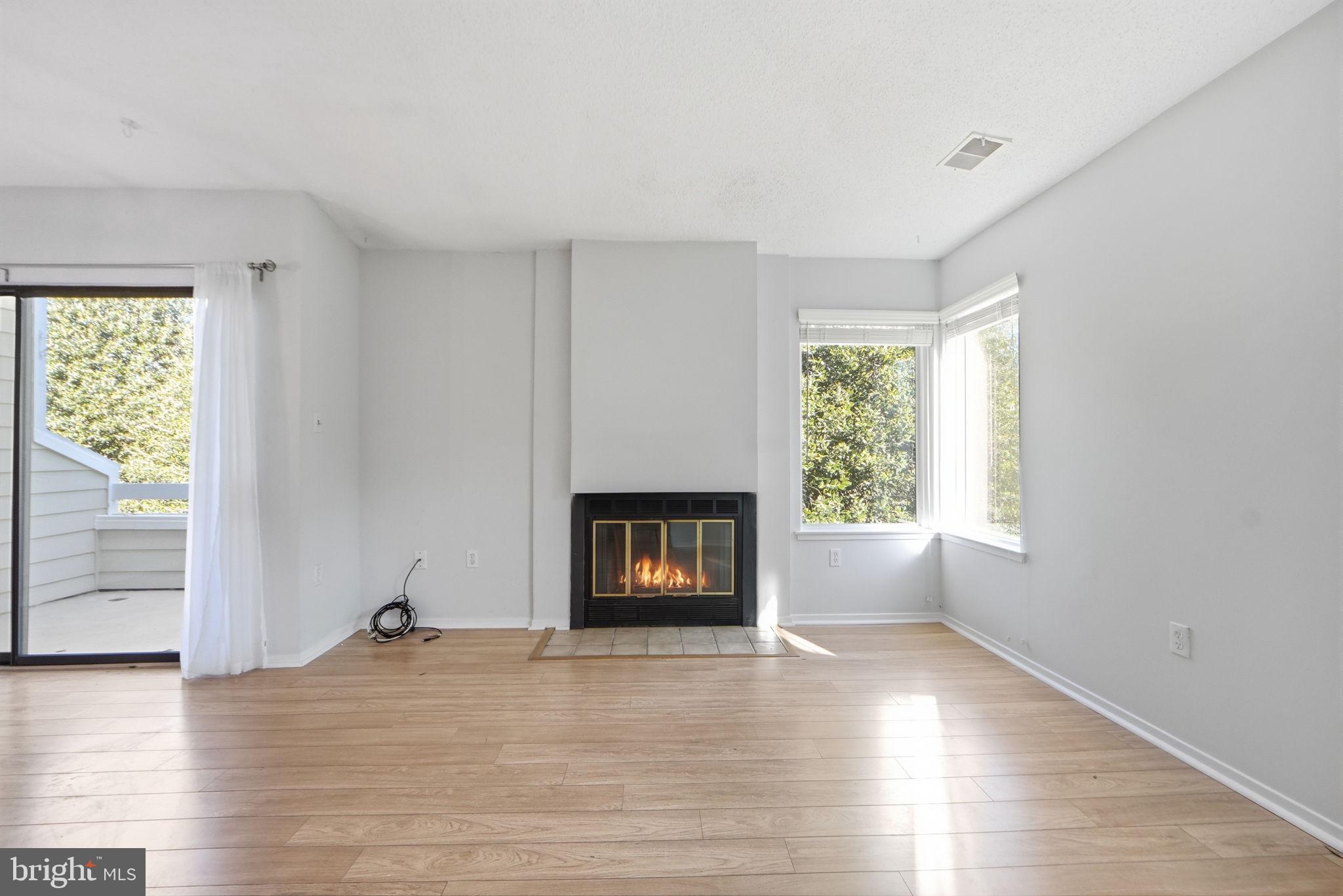 1968 Villaridge Drive Reston, VA 20191 - Photo 8 of 39 Living Room w/ laminate wood floors
