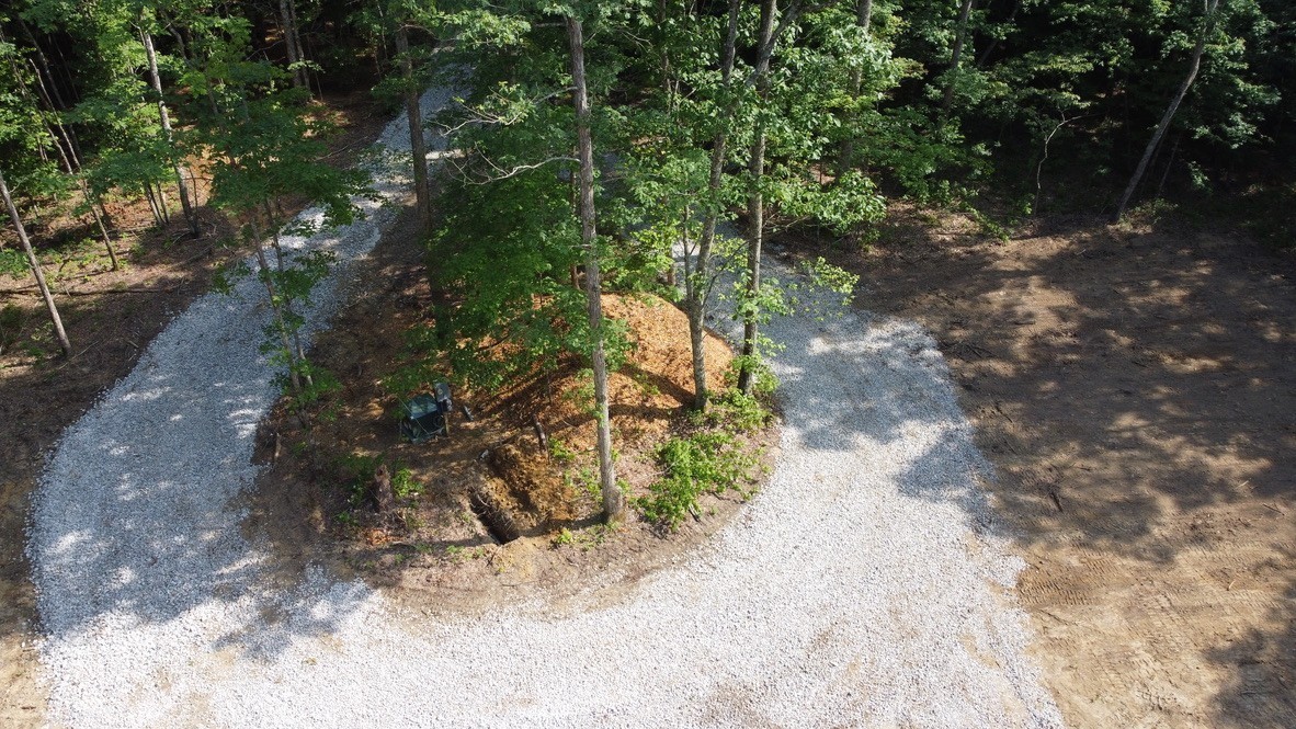 916 North Rim Drive Coalmont, TN 37313 - Photo 6 of 24 a backyard of a house with lots of green space