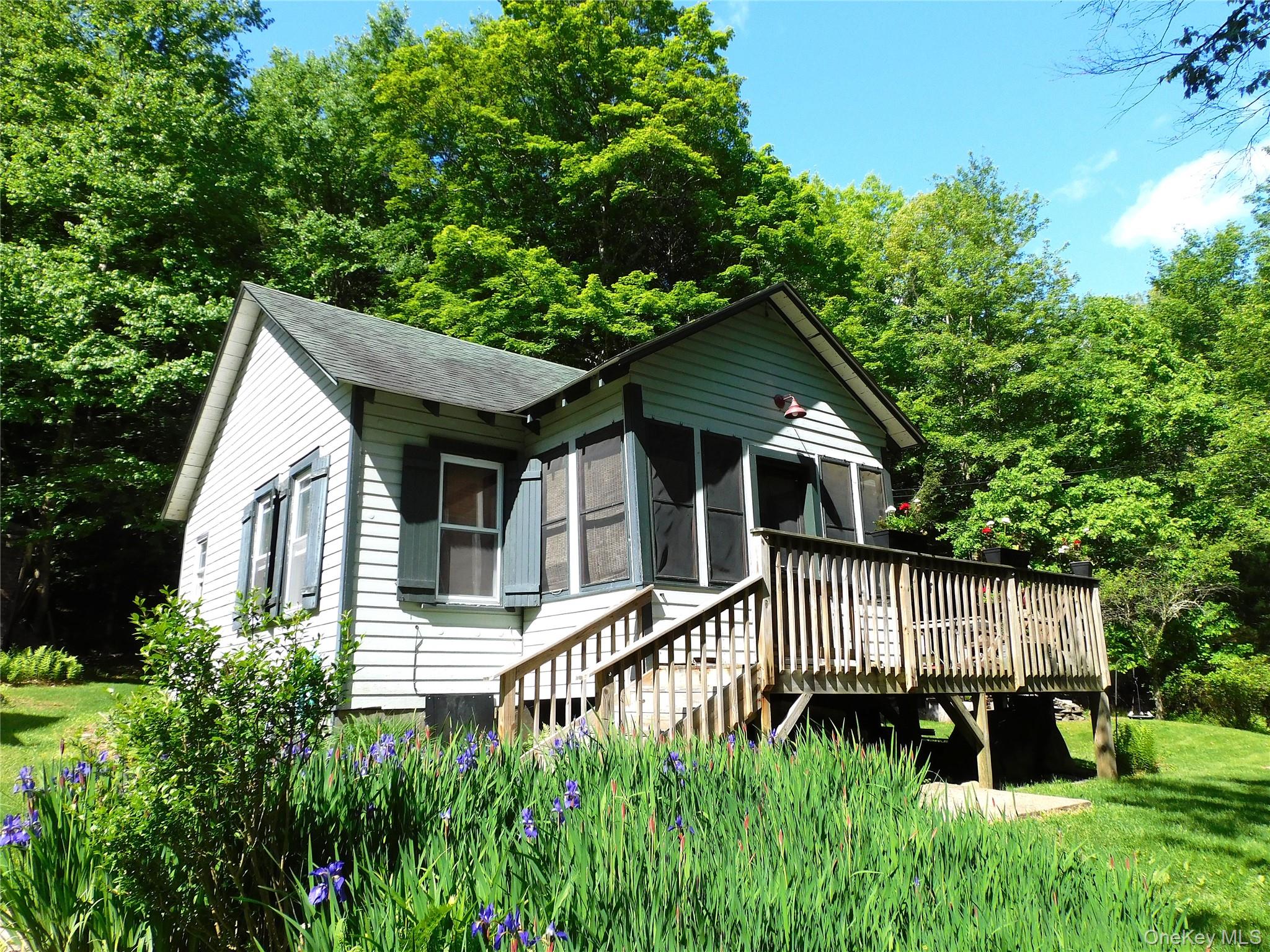 18-20 Church Road Mountain Dale, NY 12763 - Photo 3 of 20 a front view of a house with garden