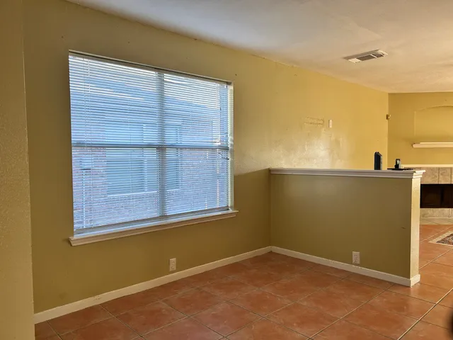 a view of a window in an empty room
