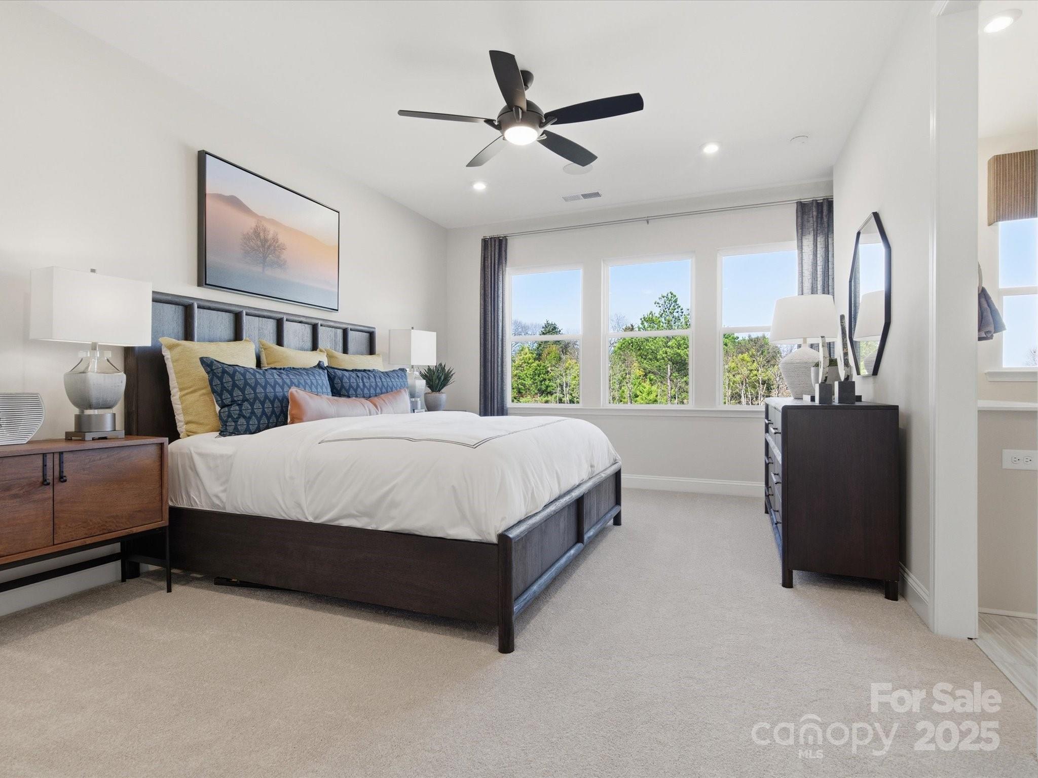 492 Nash Street Fort Mill, SC 29715 - Photo 17 of 28 a bed room with a bed and a large window