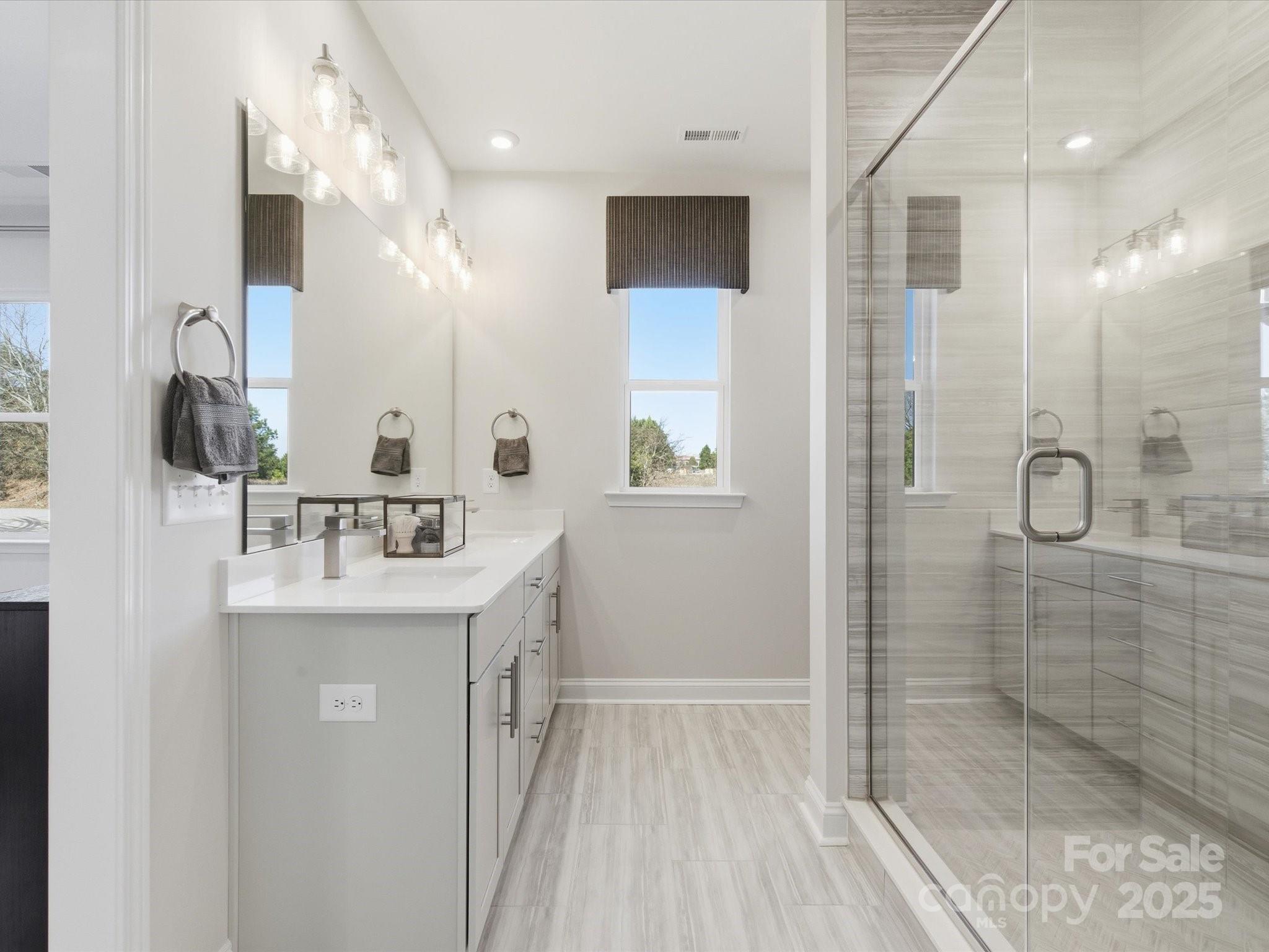 492 Nash Street Fort Mill, SC 29715 - Photo 19 of 28 a bathroom with a sink a toilet and shower