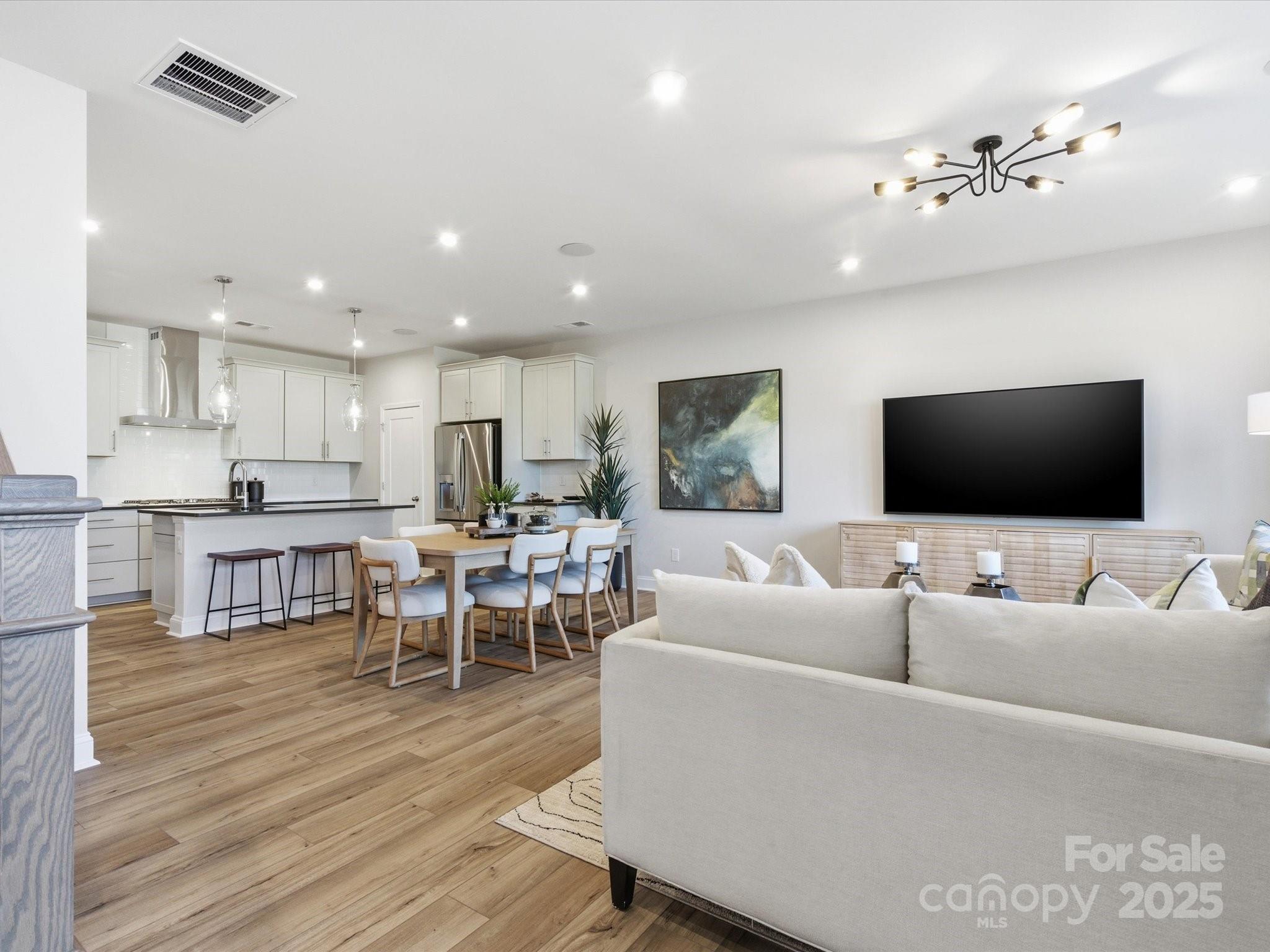 492 Nash Street Fort Mill, SC 29715 - Photo 3 of 28 a living room with furniture and a flat screen tv