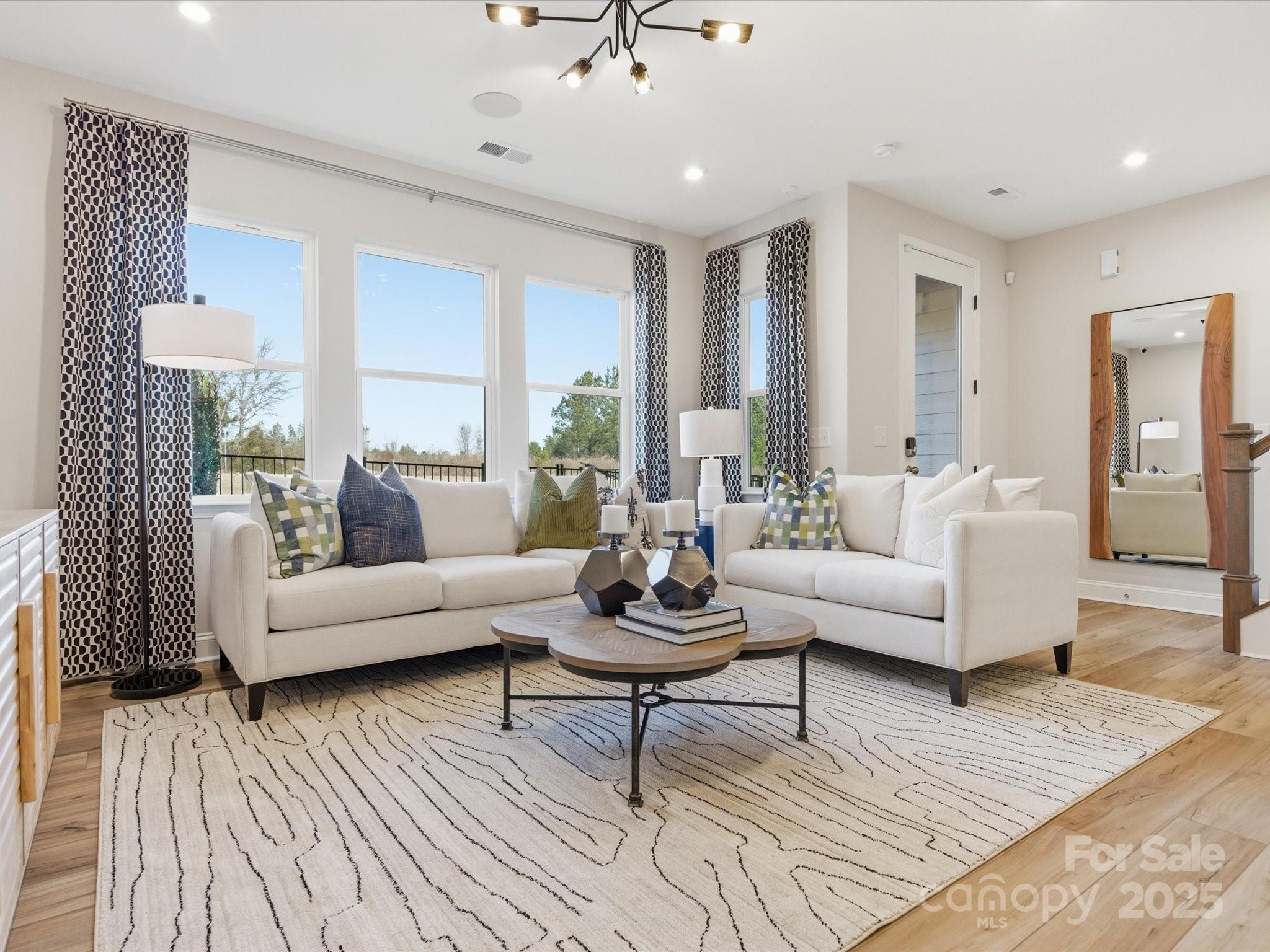 492 Nash Street Fort Mill, SC 29715 - Photo 5 of 28 a living room with furniture and a large window