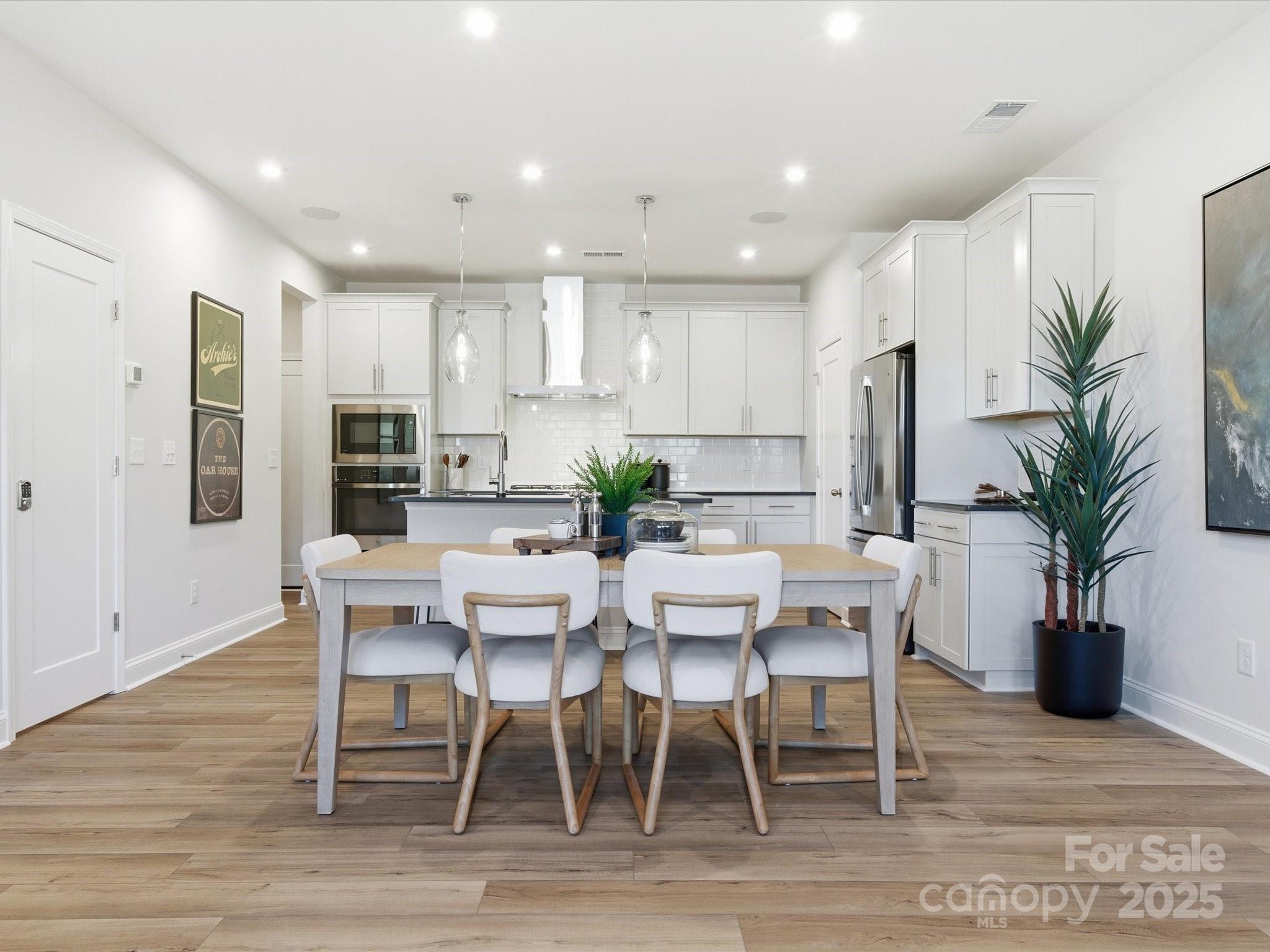 492 Nash Street Fort Mill, SC 29715 - Photo 8 of 28 a view of a dining room with furniture