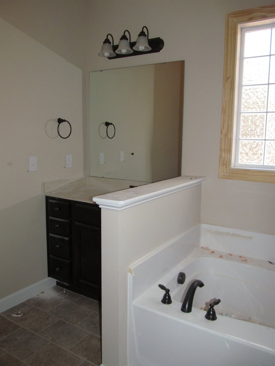 17 Savannah Ridge Court Angier, NC 27501 - Photo 12 of 24 Master Bath with Separate Tub and Shower with Dual Vanities and Linen Closet Master Bath/Spa