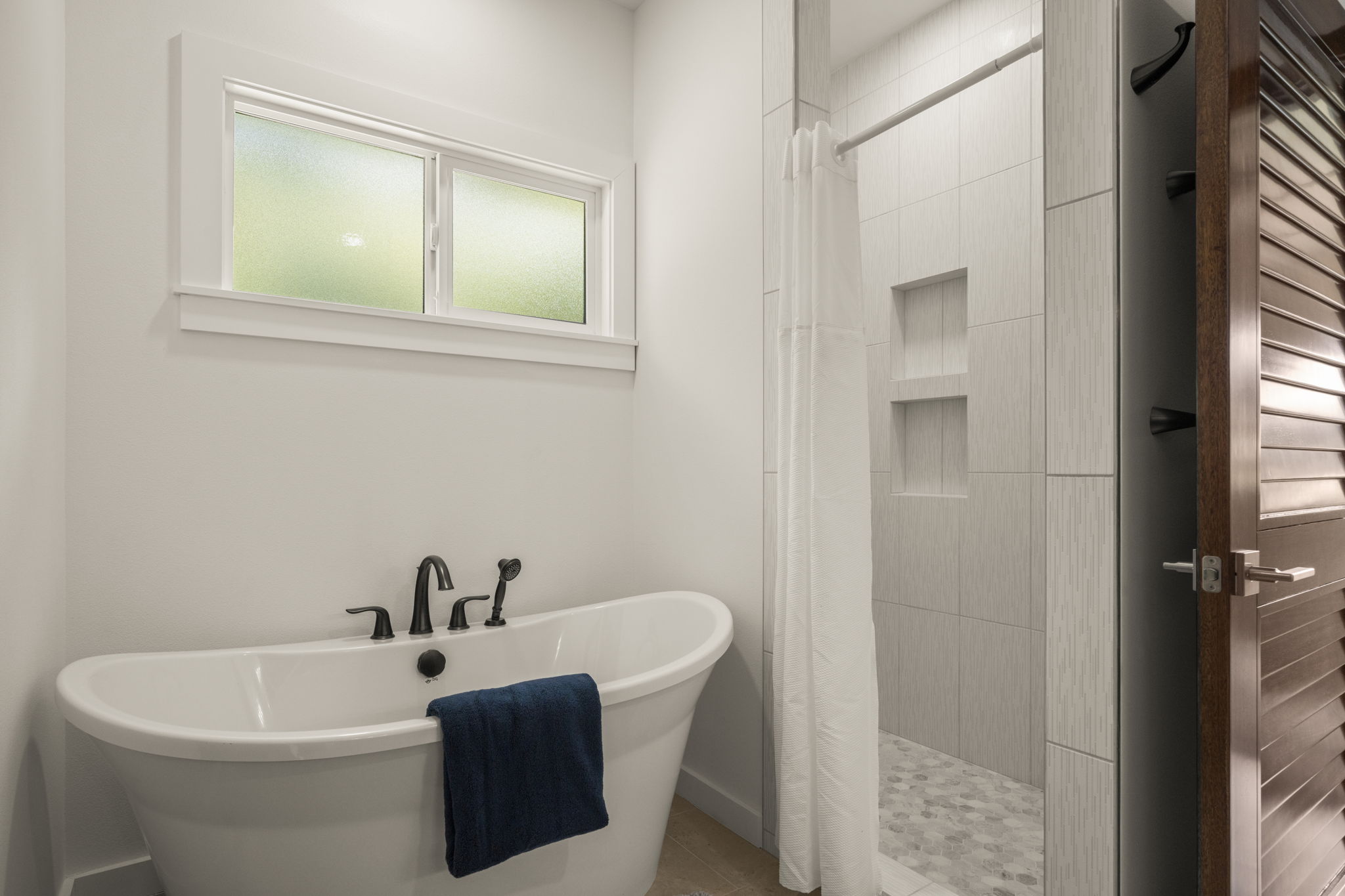 3582 Rice Street Lihue, HI 96766 - Photo 15 of 30 a white bath tub sitting next to a white sink