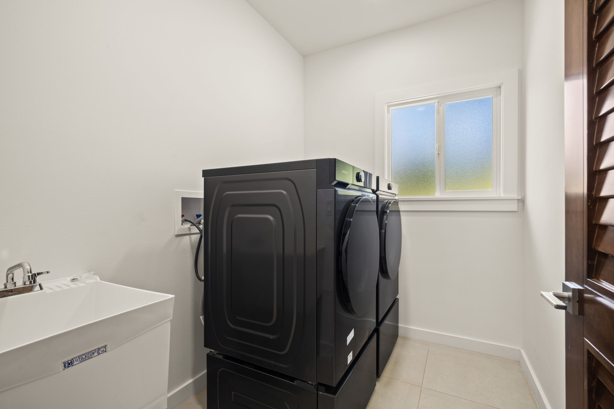 3582 Rice Street Lihue, HI 96766 - Photo 24 of 30 a utility room with dryer and washer