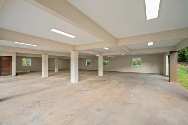 a view of a city with flower plants in front of it