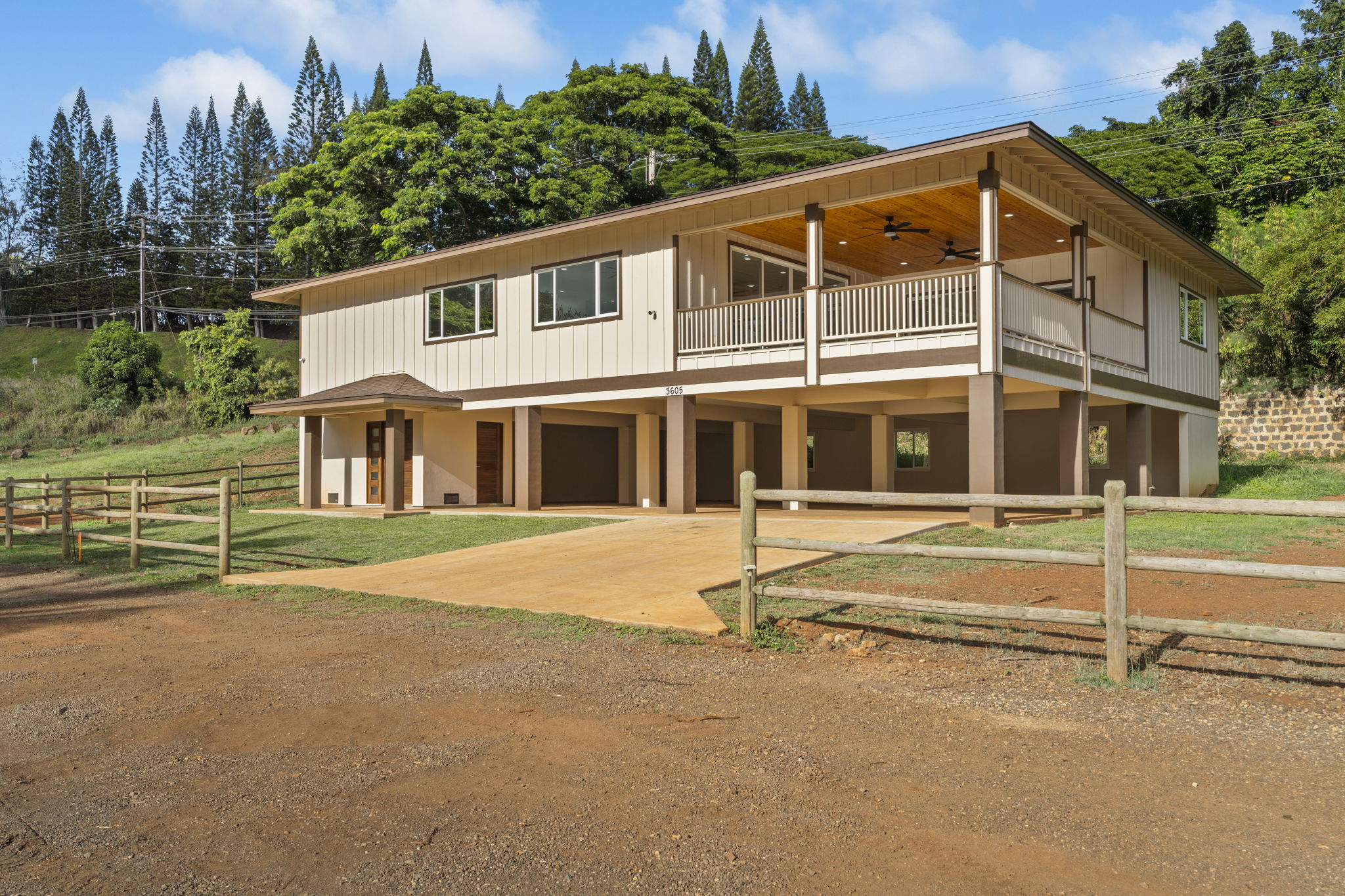 3582 Rice Street Lihue, HI 96766 - Photo 8 of 30 a front view of a house with a yard