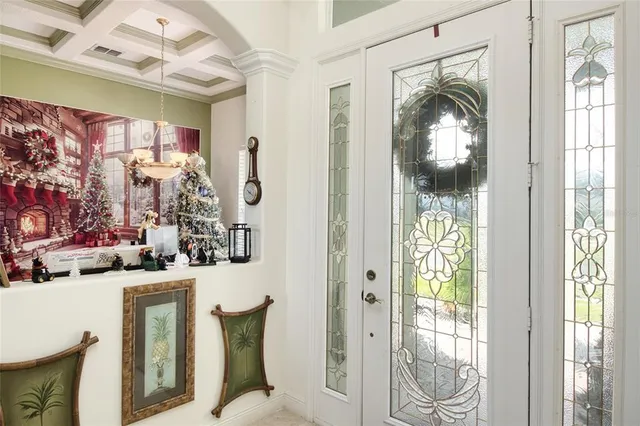 a living room with furniture or outdoor view and a large window