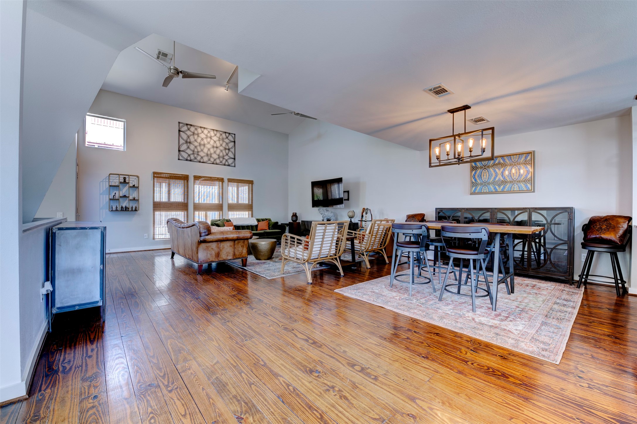 3050 Commerce Street Houston, TX 77003 - Photo 29 of 33 a living room with furniture and wooden floor