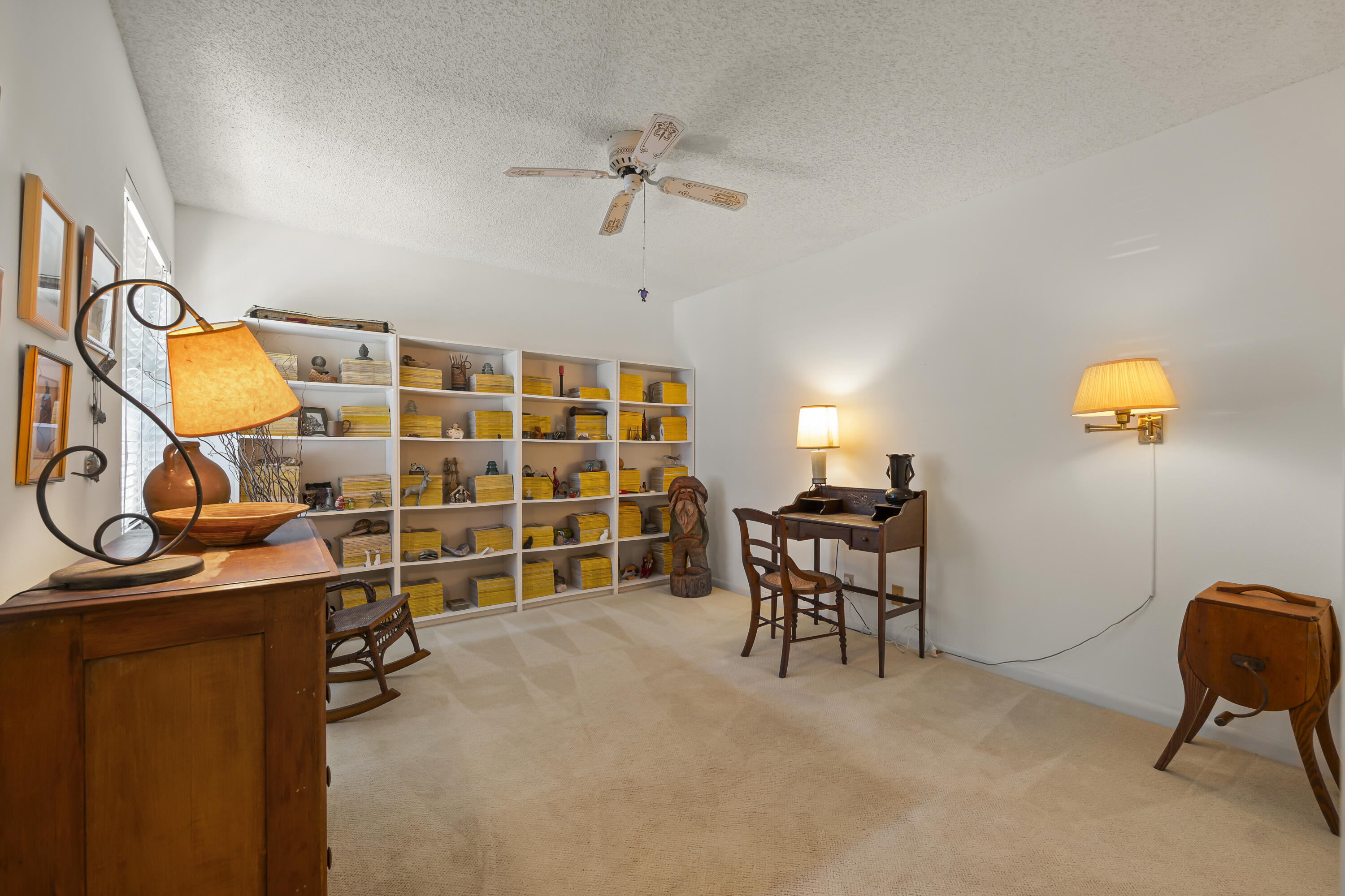 105 Ocean Dunes Circle Jupiter, FL 33477 - Photo 24 of 40 a view of a livingroom with furniture and a ceiling fan