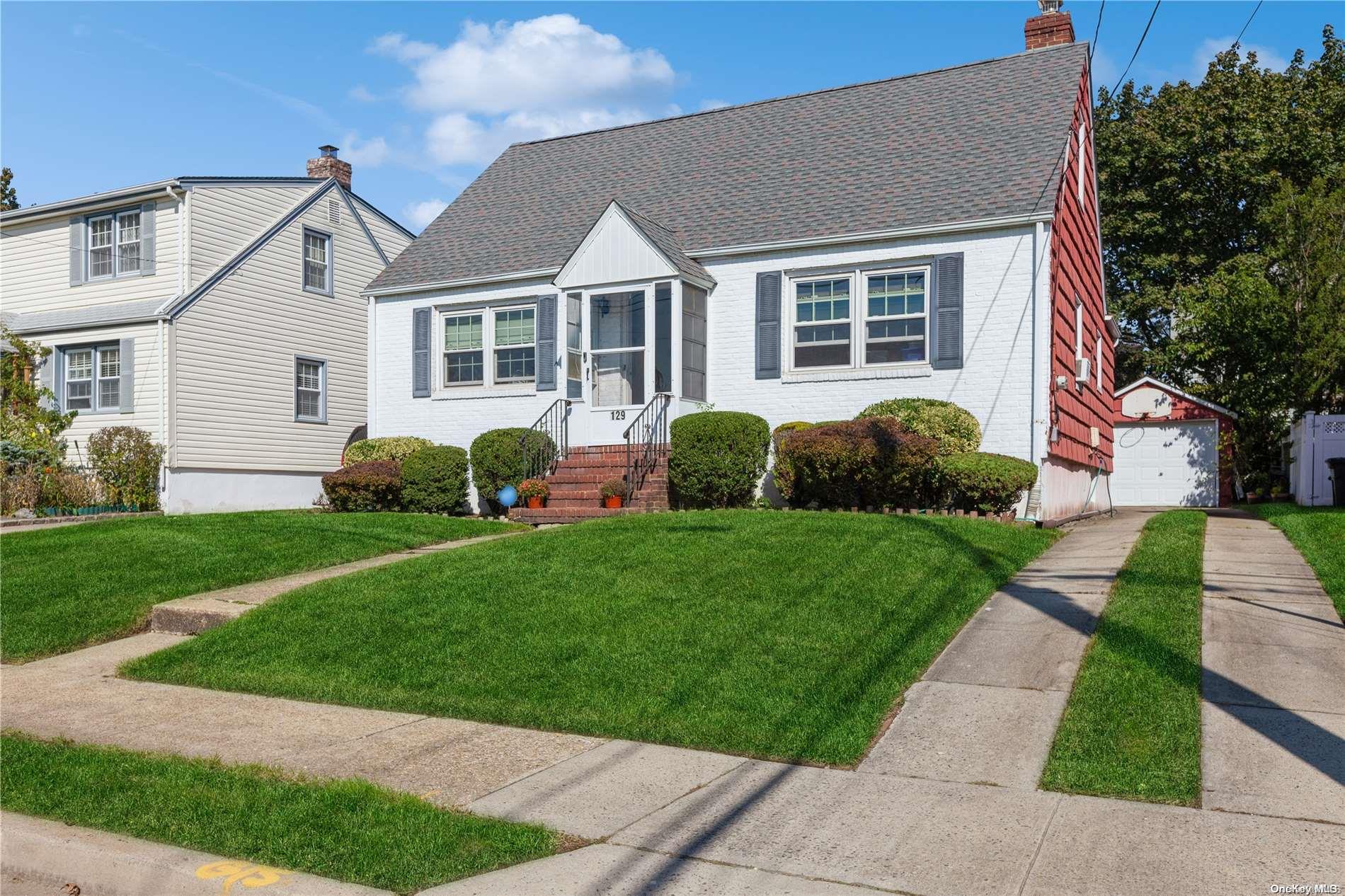129 Page Road Valley Stream, NY 11581 - Photo 1 of 1 a view of a house with a backyard