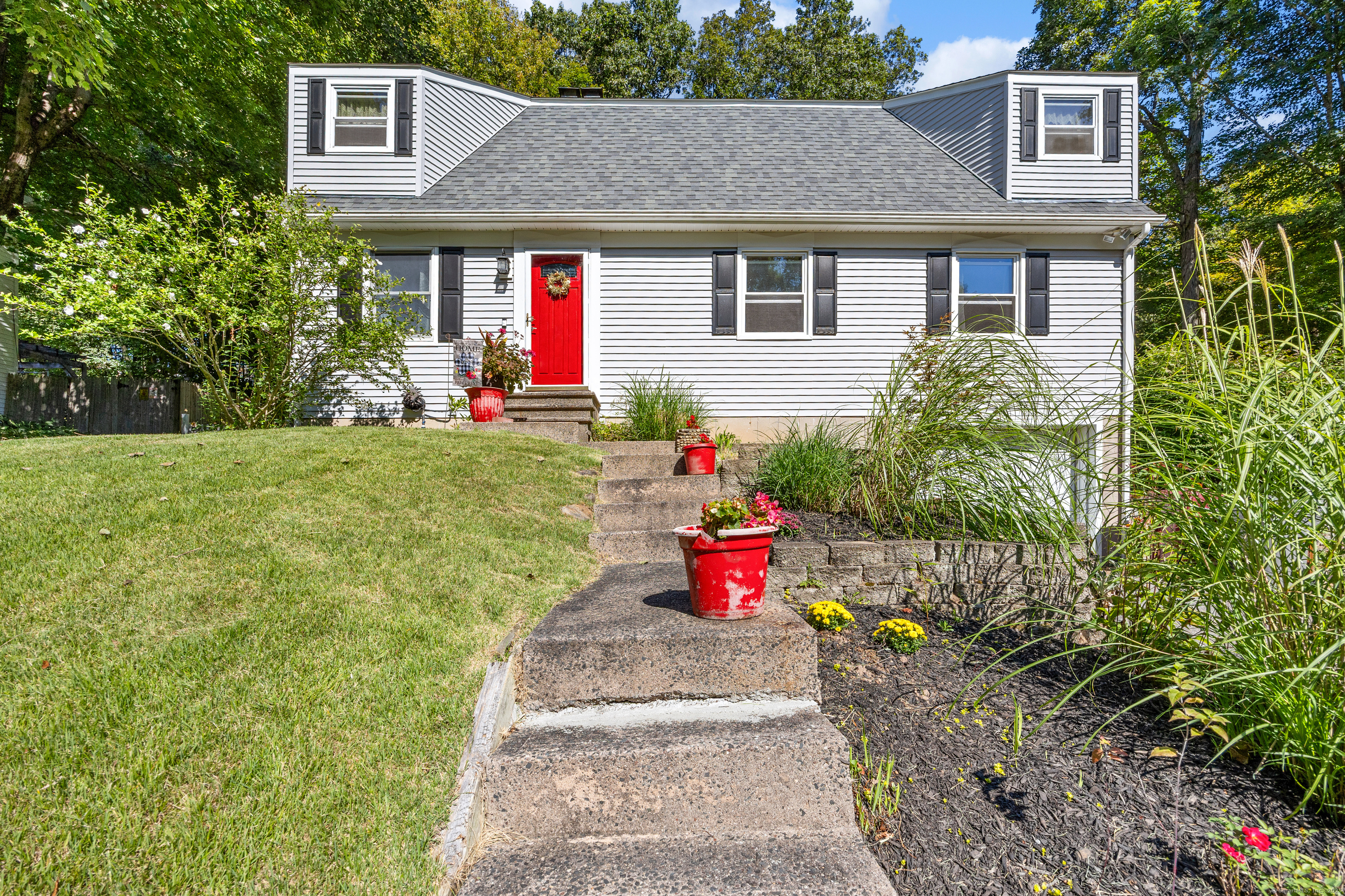 138 Red Robin Road Naugatuck, CT 06770 - Photo 1 of 1 a front view of a house with a yard
