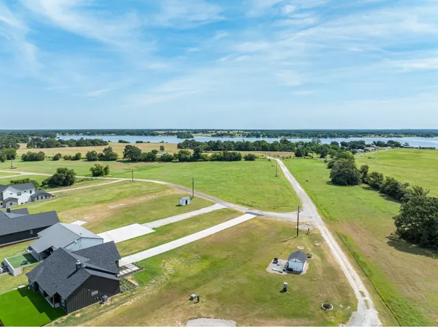 a view of a swimming pool with a lounge chair