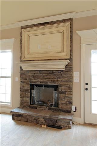 776 Academy Road, Unit 6C Lebanon, TN 37087 - Photo 6 of 16 a living room with a fireplace in it