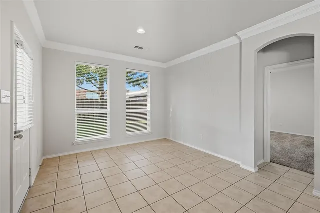 a view of an empty room with window