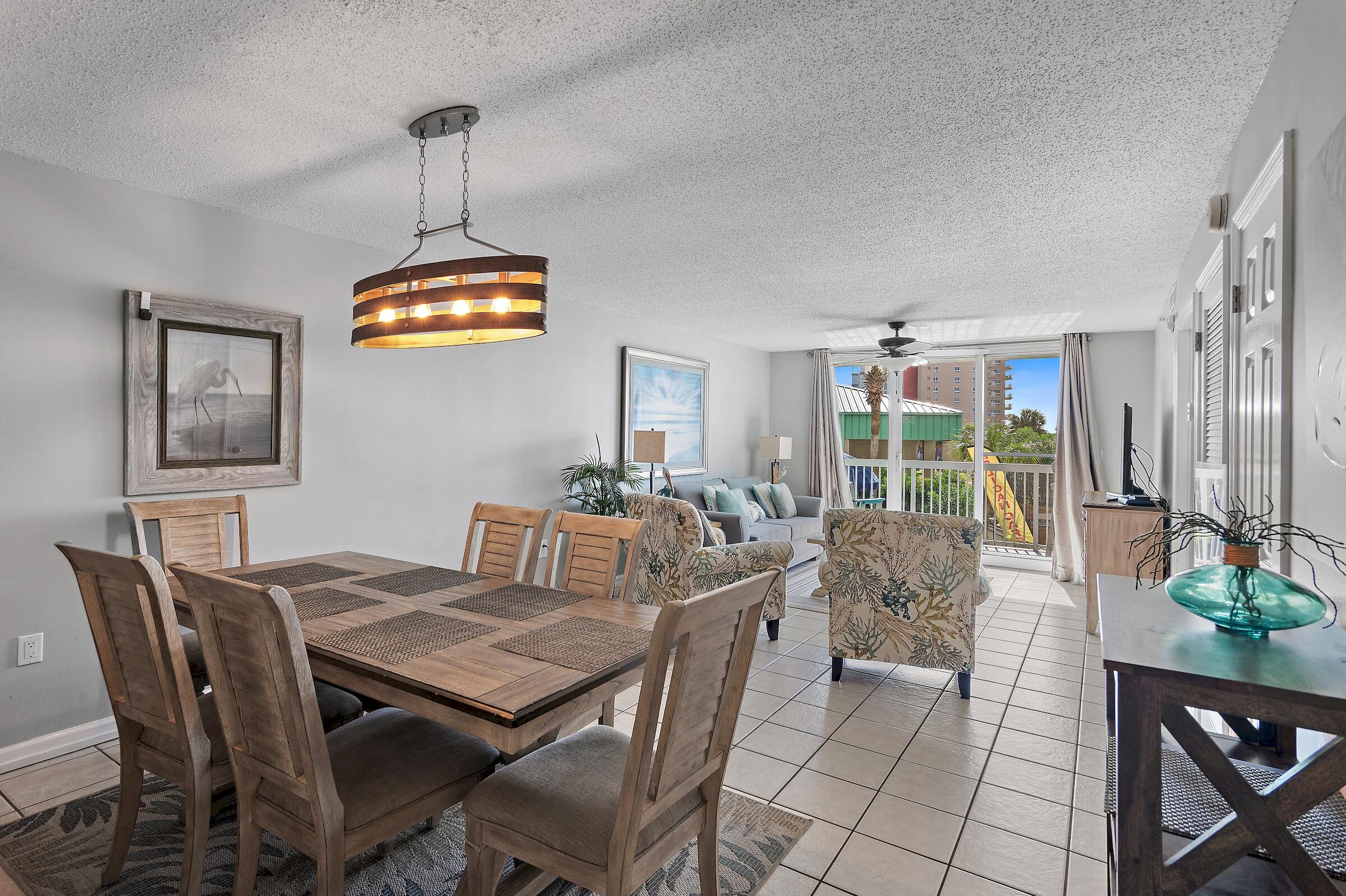 1002 Highway 98, Unit 217 Destin, FL 32541 - Photo 20 of 48 a view of a dining room with furniture window and outside view
