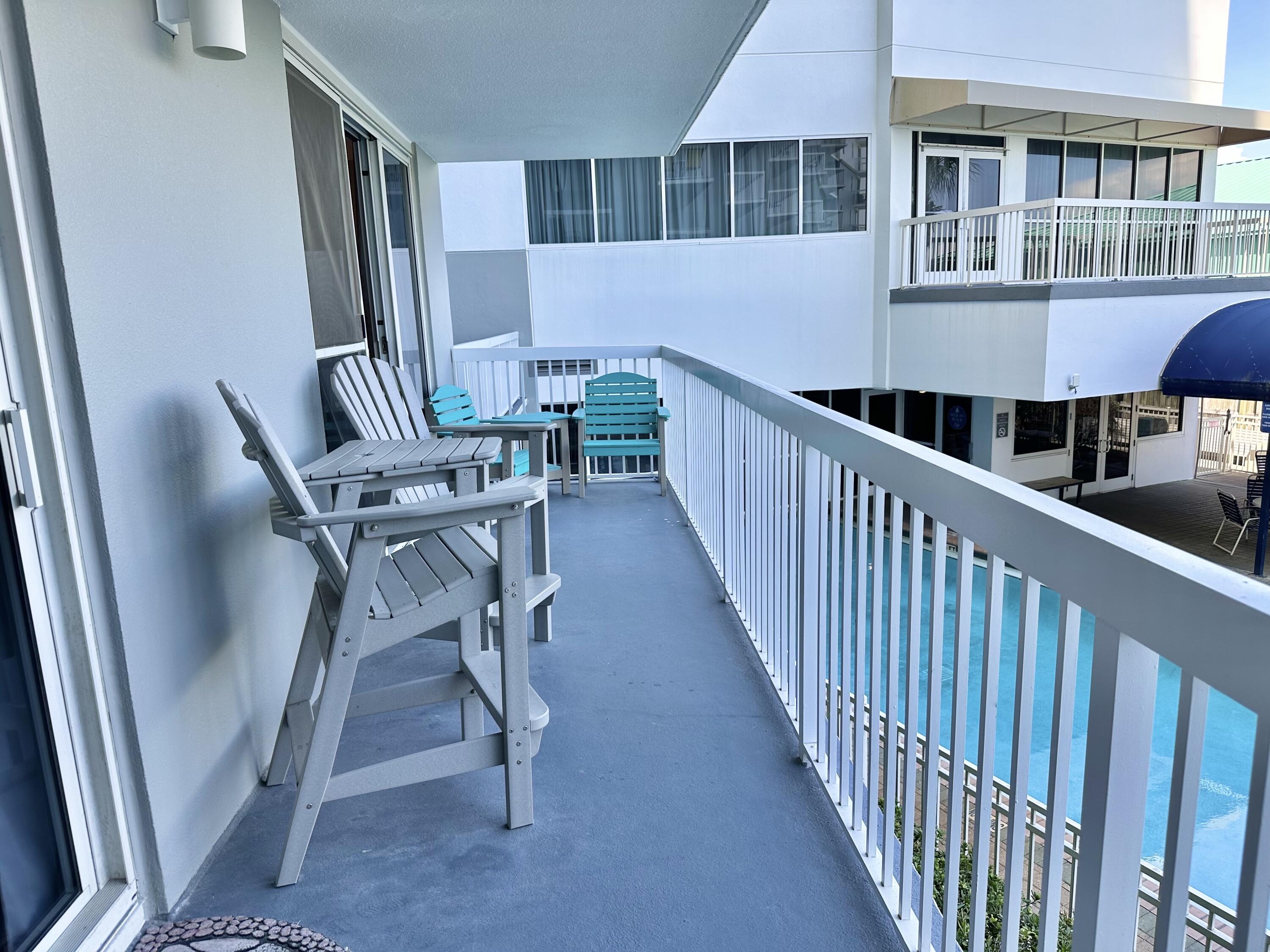 1002 Highway 98, Unit 217 Destin, FL 32541 - Photo 28 of 48 a view of a balcony with chairs