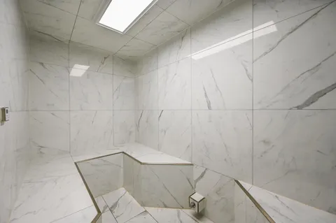 a picture of a bench in a room