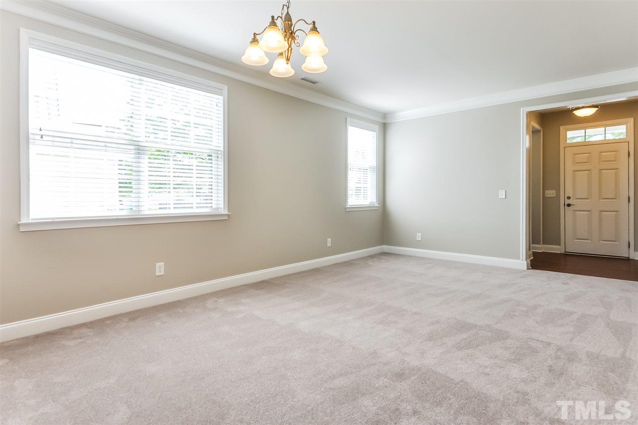 187 Solheim Lane Raleigh, NC 27603 - Photo 13 of 25 a view of an empty room with a window