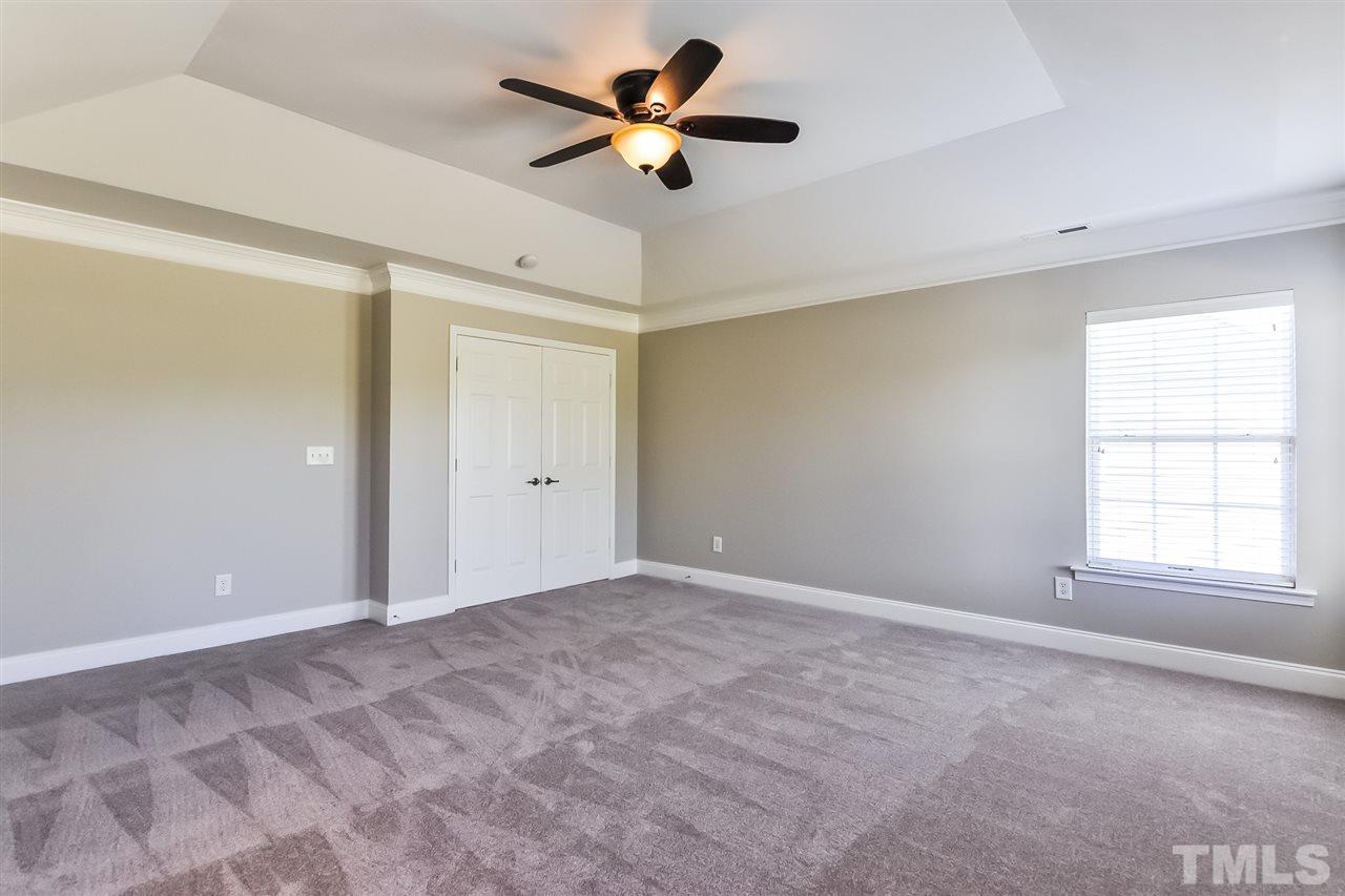 187 Solheim Lane Raleigh, NC 27603 - Photo 17 of 25 wooden floor in an empty room with a window