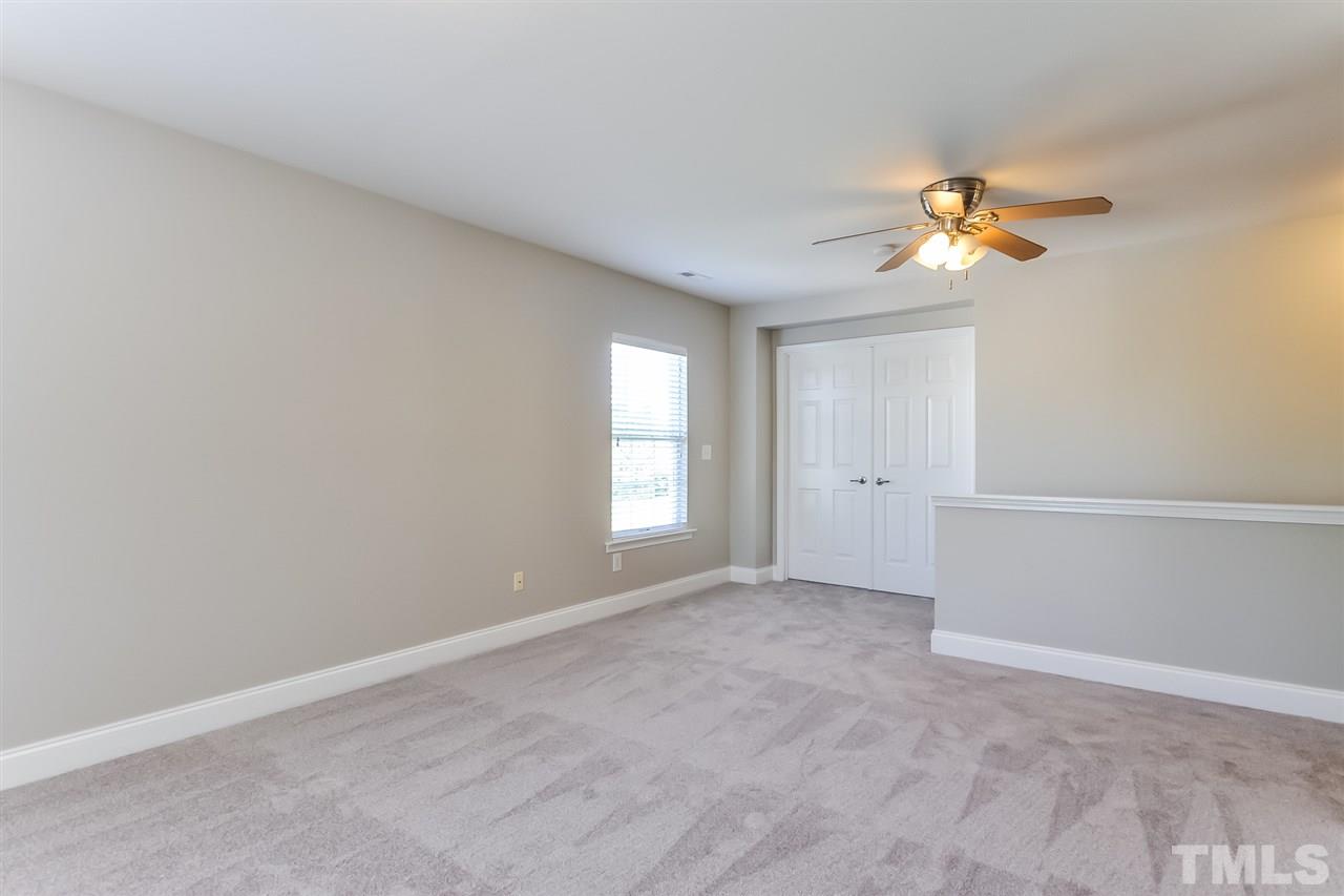 187 Solheim Lane Raleigh, NC 27603 - Photo 19 of 25 a view of empty room with ceiling fan