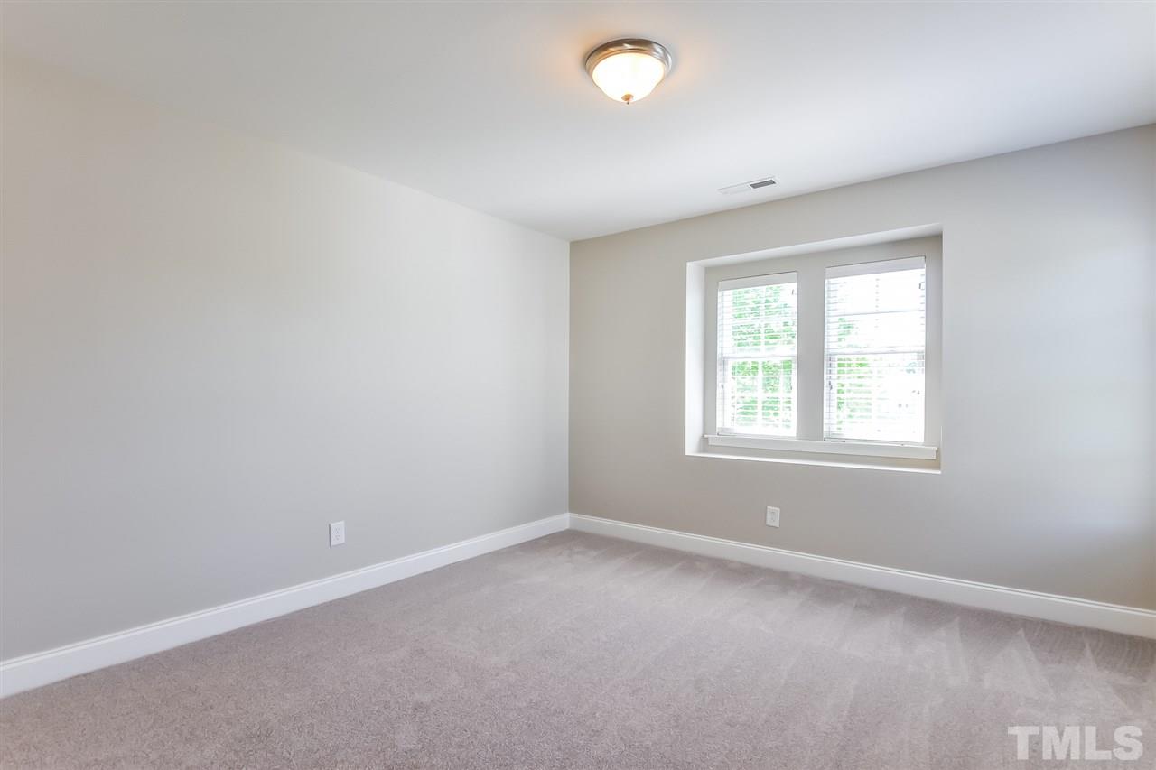 187 Solheim Lane Raleigh, NC 27603 - Photo 20 of 25 an empty room with a window
