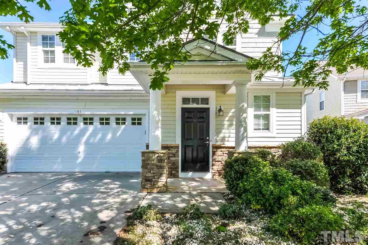 187 Solheim Lane Raleigh, NC 27603 - Photo 7 of 25 a front view of a house with a yard