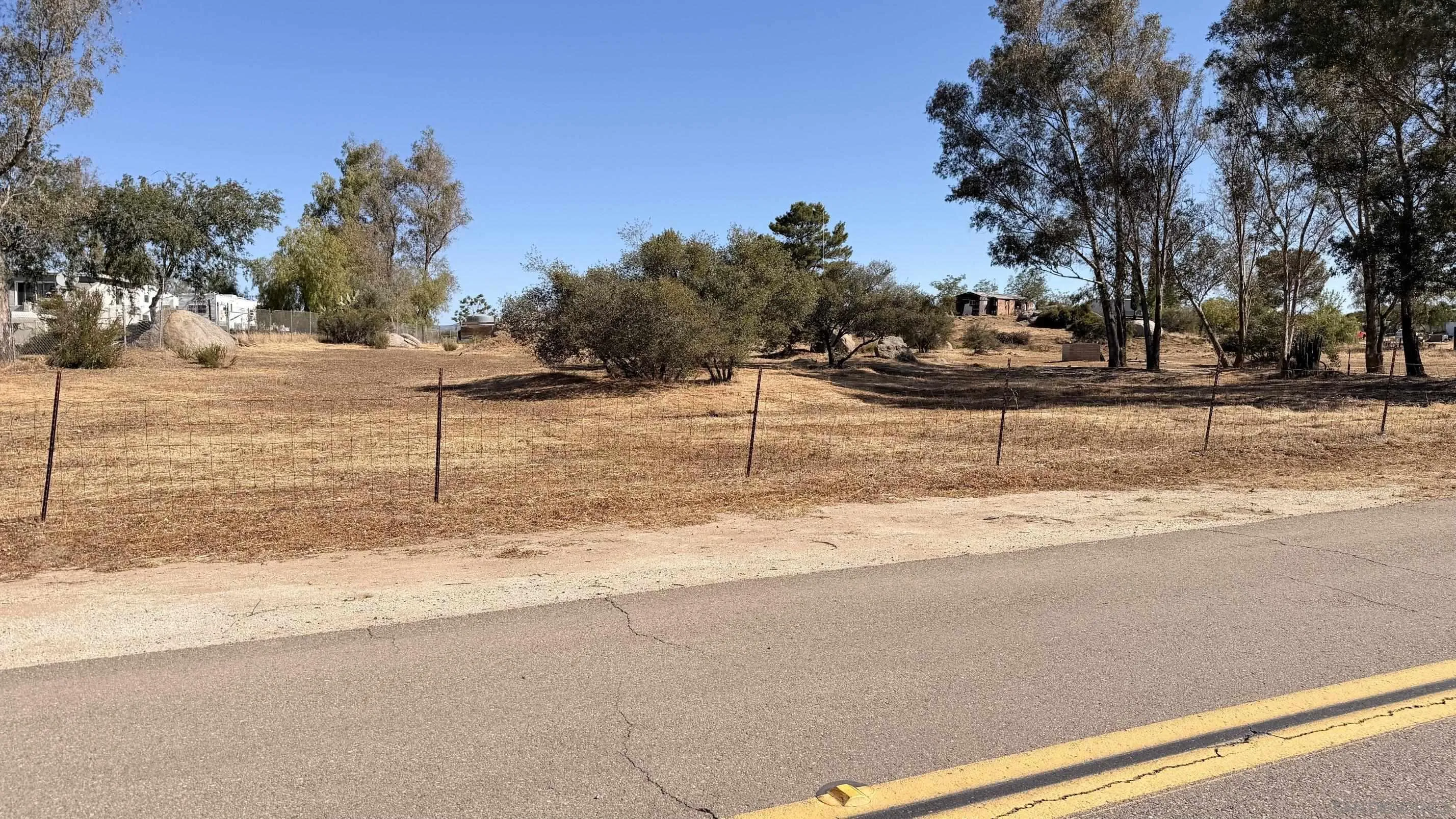 1030 Harris Ranch Road Potrero, CA 91963 - Photo 2 of 10 a view of a yard with snow on the road