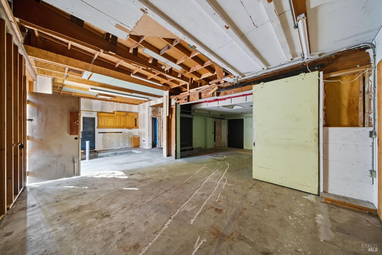 226 Bayview Street San Rafael, CA 94901 - Photo 28 of 56 a view of a hallway with wooden walls
