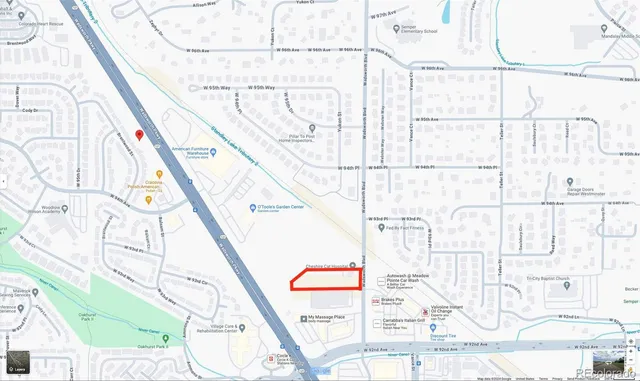 an aerial view of a house with a garden