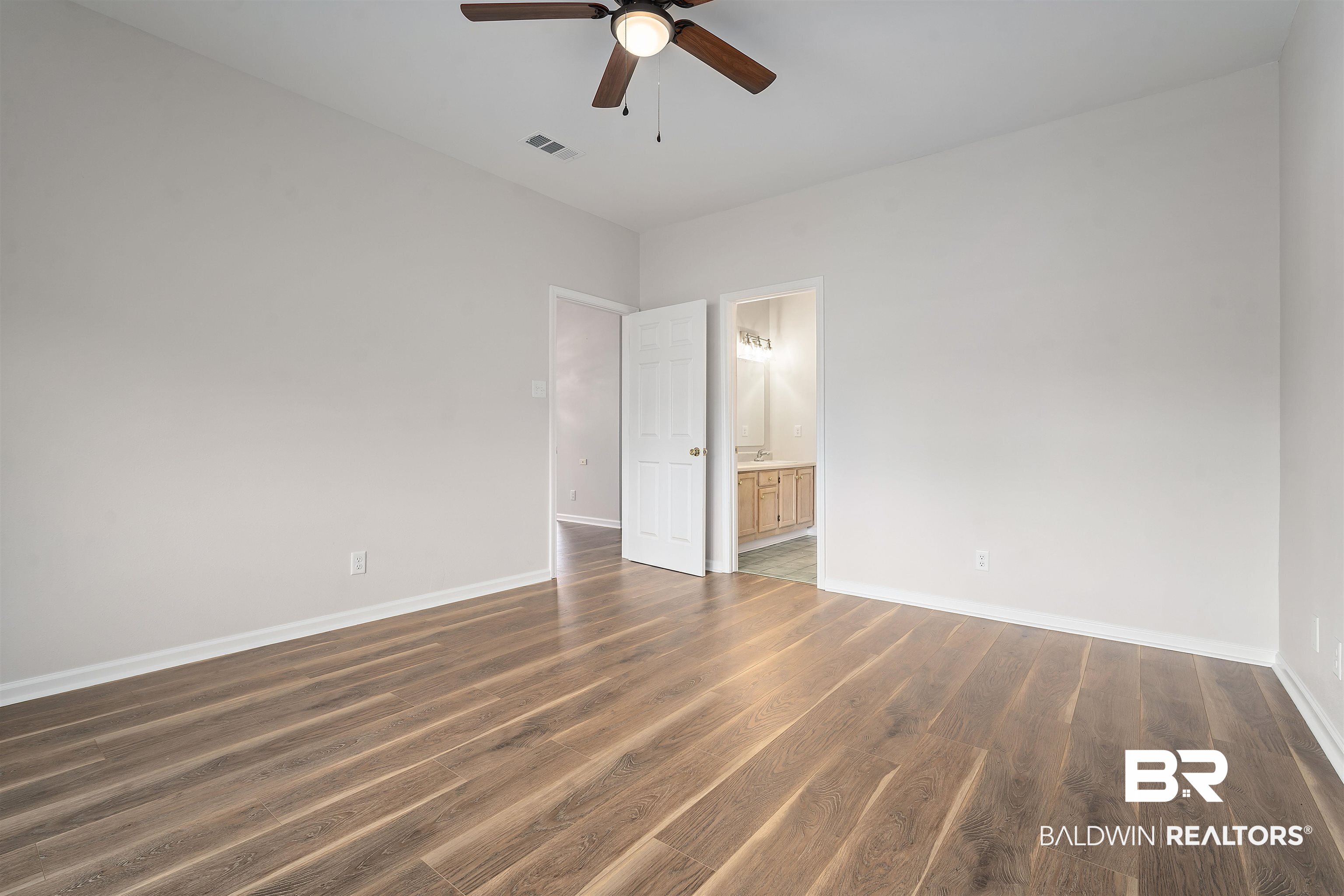 250 North Spring Lake Drive Mobile, AL 36695 - Photo 12 of 29 Master bedroom to private bathroom.