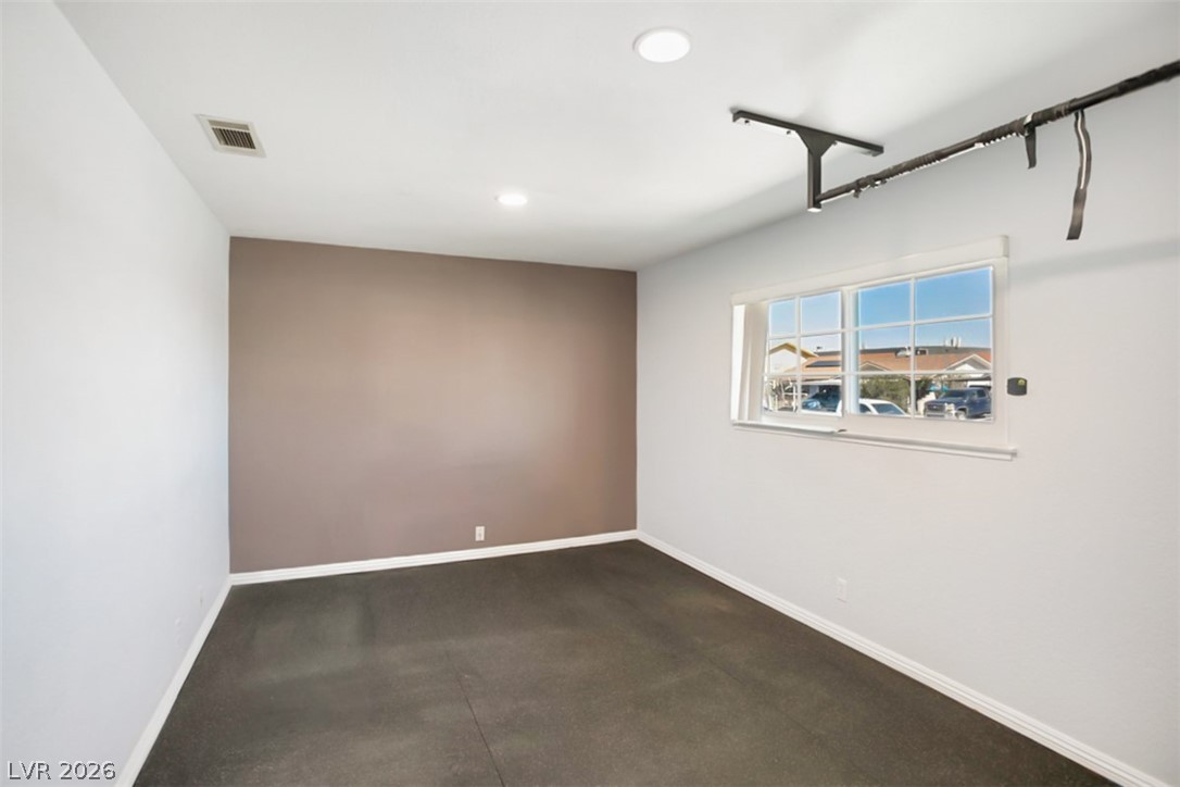 228 Redstone Street Las Vegas, NV 89145 - Photo 23 of 31 Empty room featuring recessed lighting and baseboards