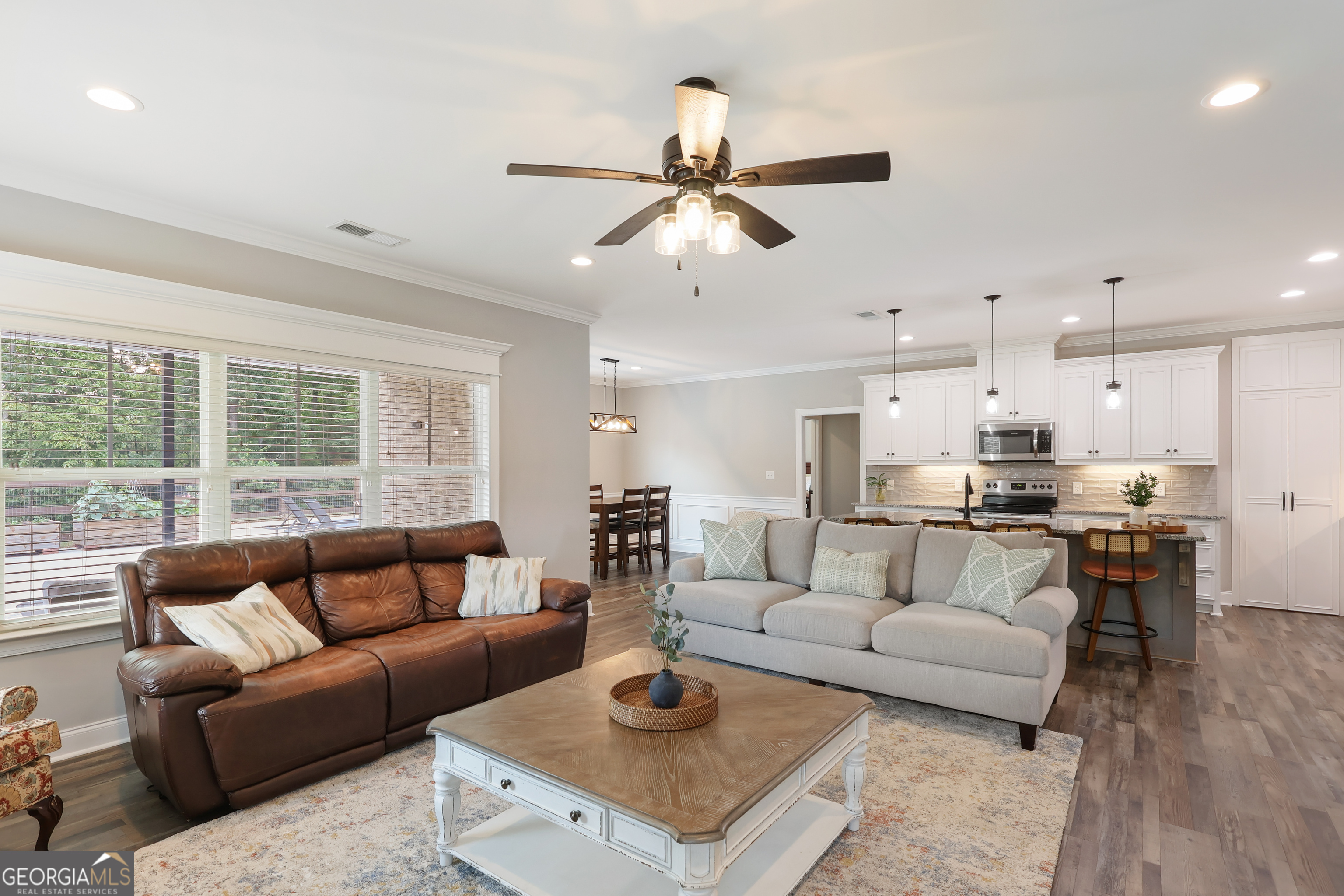 89 Claire Road Forsyth, GA 31029 - Photo 13 of 40 a living room with furniture and a large window